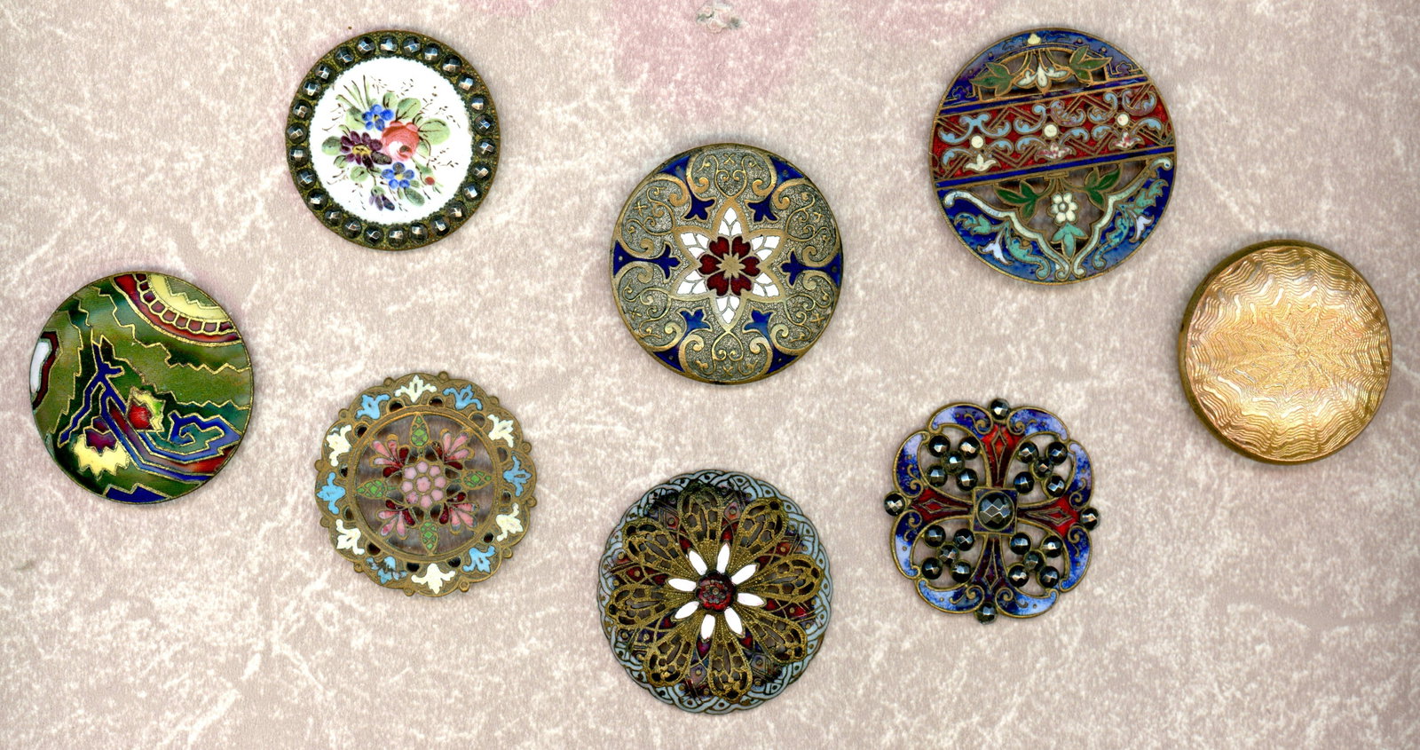 A PARTIAL CARD OF DIVISION ONE ENAMEL BUTTONS: 8 Large 19th century examples in assorted techniques. This partial card includes a nice variety of colorful enamels. Take a good close look. DimensionsSM=Less than 3/4", Medium=3/4" to 1 1/4". Large=1