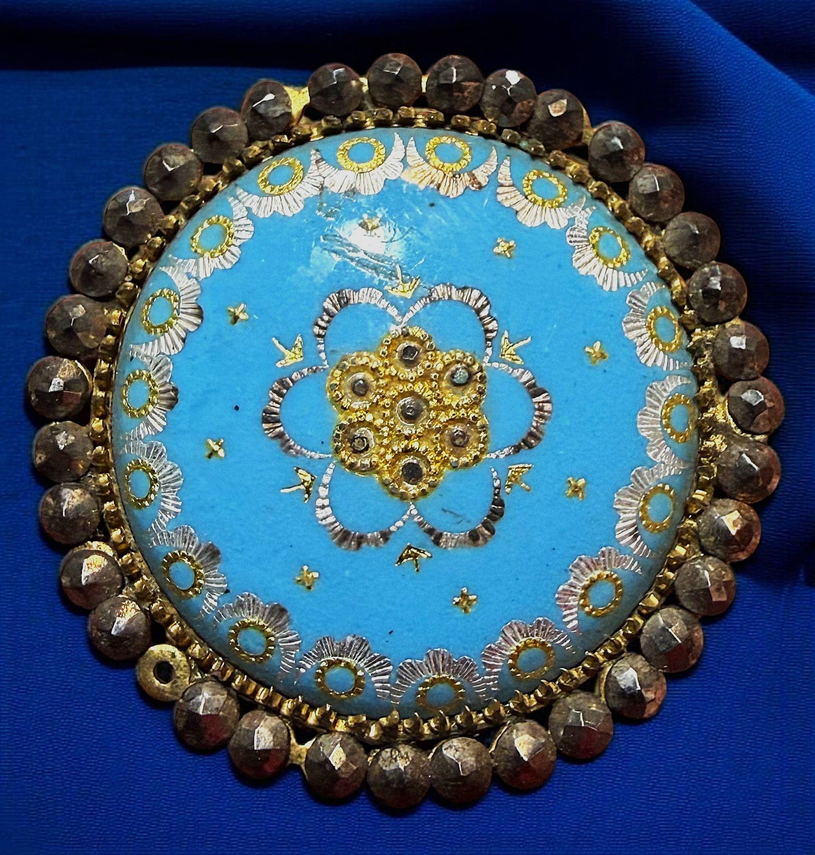 A DIVISION ONE FRENCH ENAMEL AND CUT STEEL BUTTON: 1 Large 19th century foil embedded pattern example. This is a beautiful sky blue enamel button with gold paillons in a pattern design bordered in cut steels. DimensionsSM=Less than 3/4", Medium=3/4" t