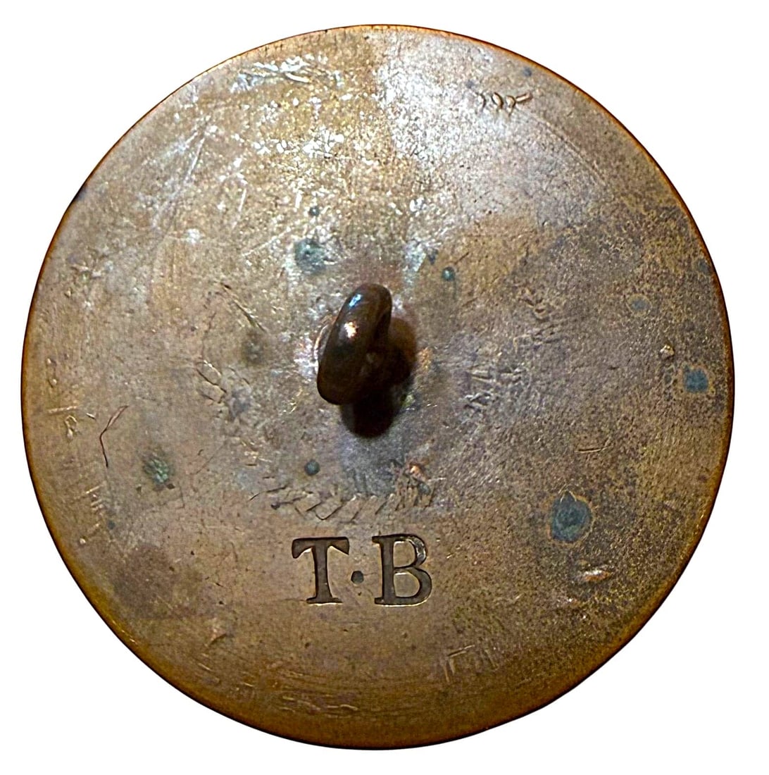 A DIVISION ONE HAND TOOLED COPPER BUTTON - 2