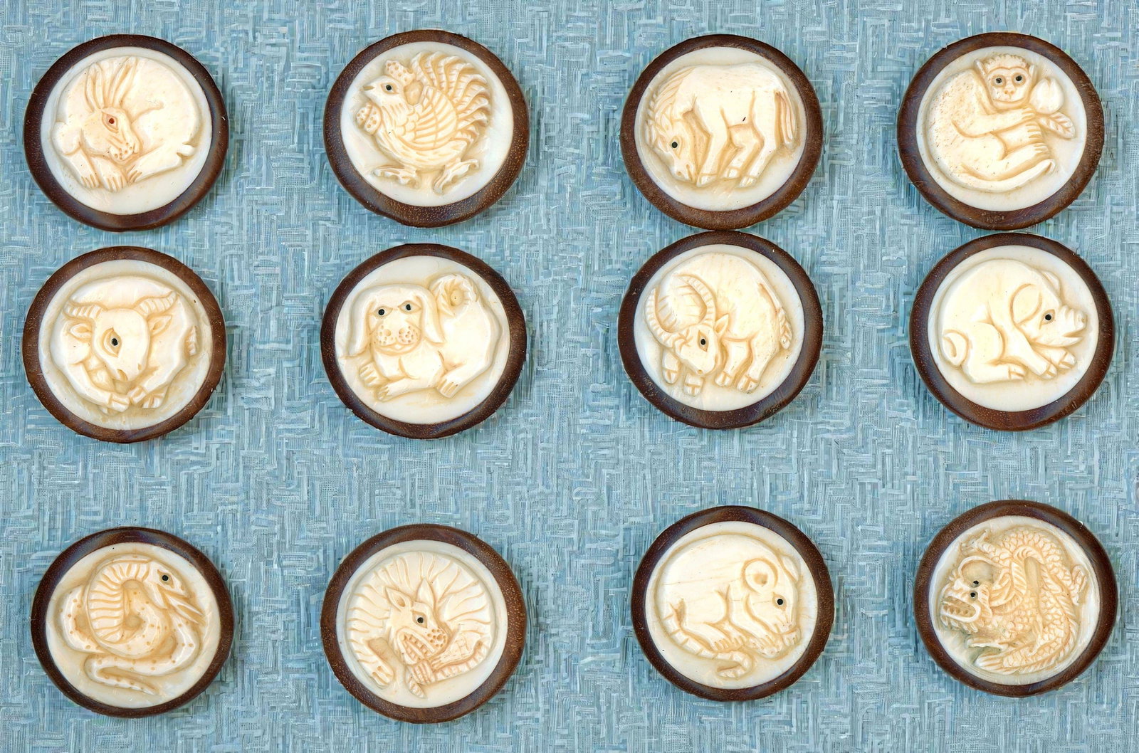 A SELECTION OF DIVISION THREE BONE IN WOOD BUTTONS (1 of 4)