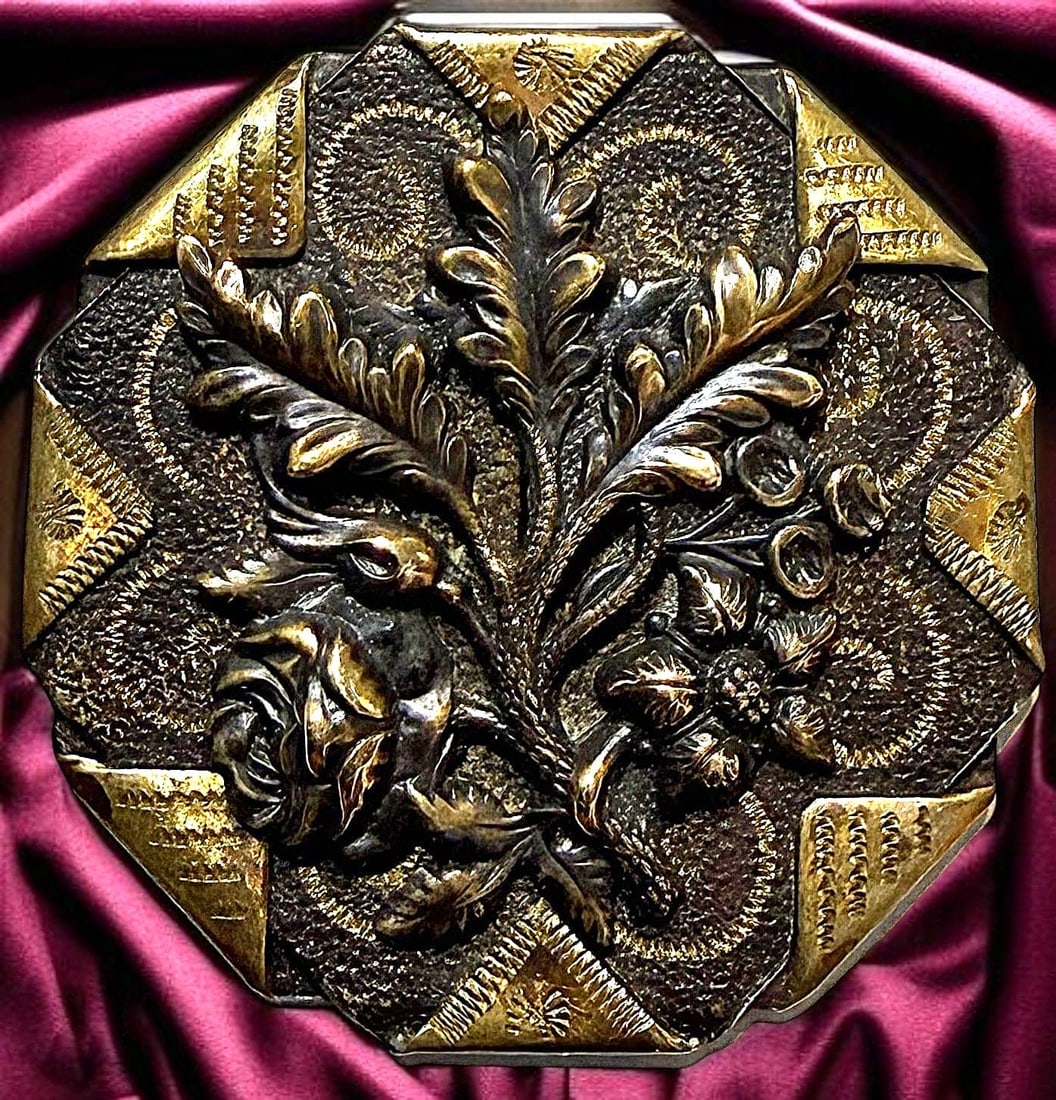 A DIVISION ONE BRASS PICTORIAL BUTTON: 1 Large 19th century detailed handkerchief corner button. This stunning condition desirable 8 corner handkerchief corner example has a beautiful tole background. A very desirable button. DimensionsSM=