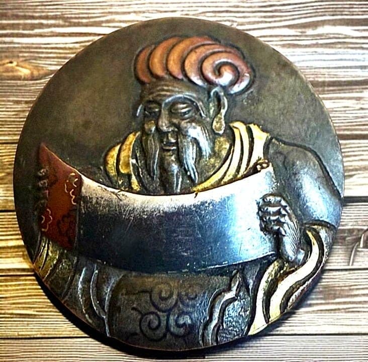 A DIVISION ONE JAPANESE METAL WORKS BUTTON: 1 Large medium late 19th century Shakudo metal button. This is a stunning example of Japanese metal works known as Shakudo. The base metal of bronze is covered with copper-Gold and Silver in this very