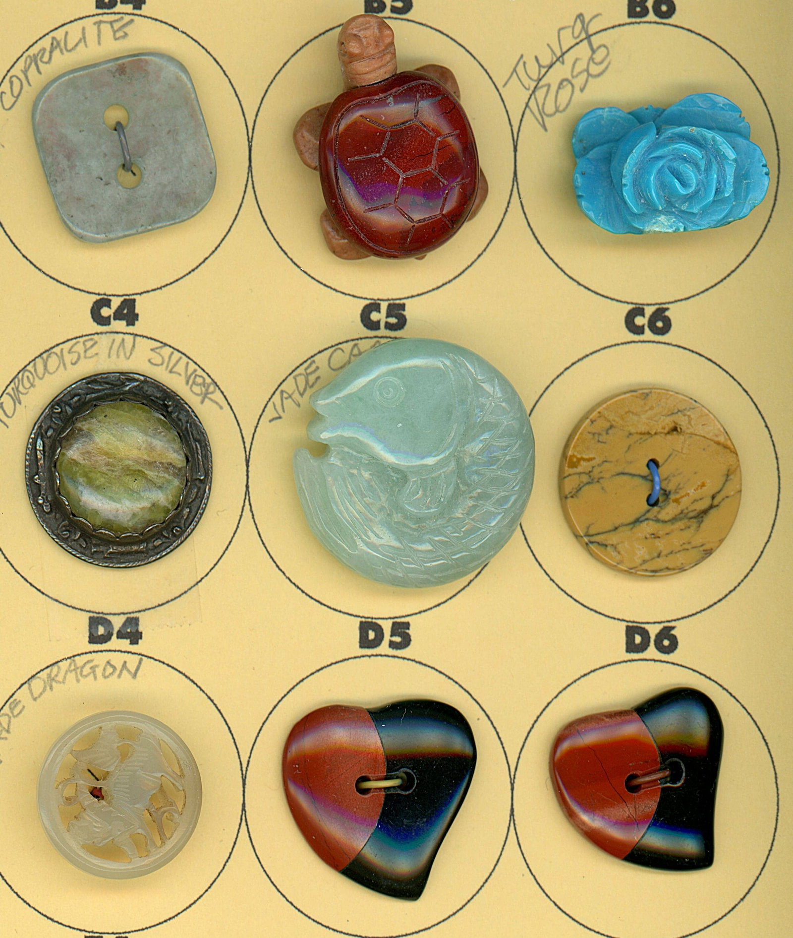 A PARTIAL CARD OF DIVISION 1 & 3 GEMSTONE BUTTONS: 9 Medium/Large 19th/20th century assorted semi precious examples. This lot includes Turquoise, Jade, Agate and more. Some mounted in metal. From the fun and eclectic collection of Nikii Deal. Dimensio