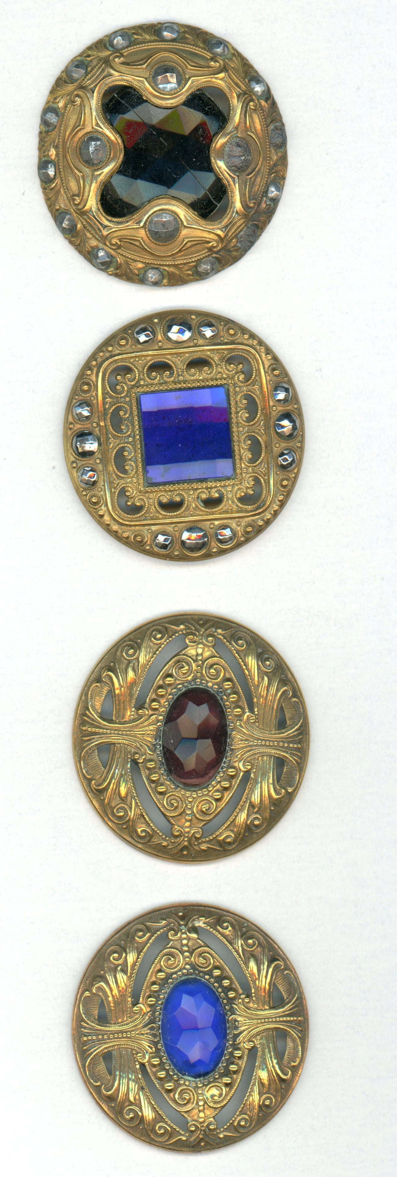 A SMALL CARD OF DIVISION ONE LARGE JEWLED BUTTONS: 4 Large 19th century authentic Gay 90 examples. This small card includes some wonderful examples of these desirable type buttons known as Gay 90's as they were produced in the 1890's. This lot is for