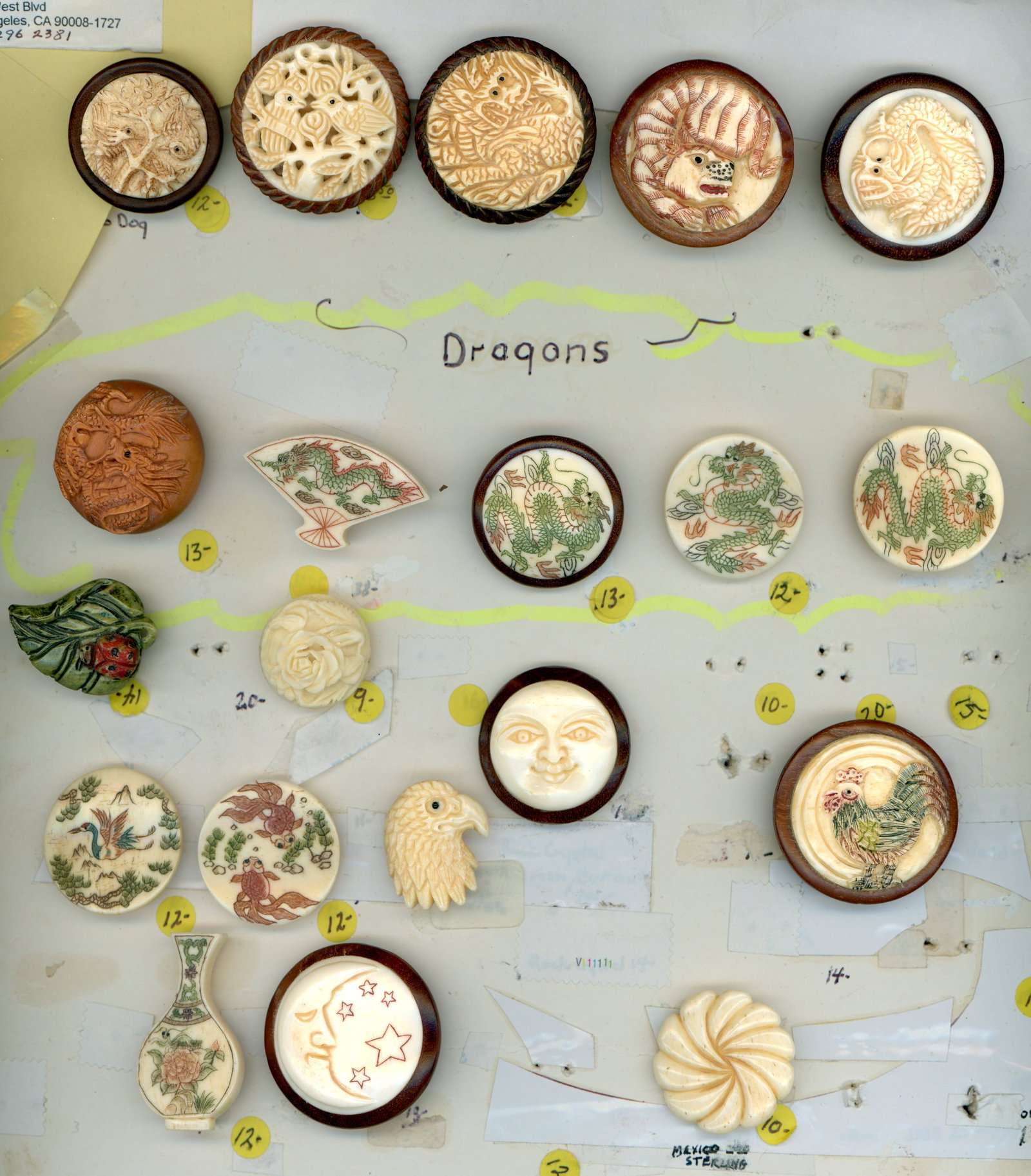 A CARD OF DIVISION THREE PICTORIAL BUTTONS: 20 Medium/Large 21st century natural material examples. This card includes realistic shapes, set in wood, carved, animals, and much more look closely. DimensionsSM=Less than 3/4", Medium=3/4" to 1 1/4