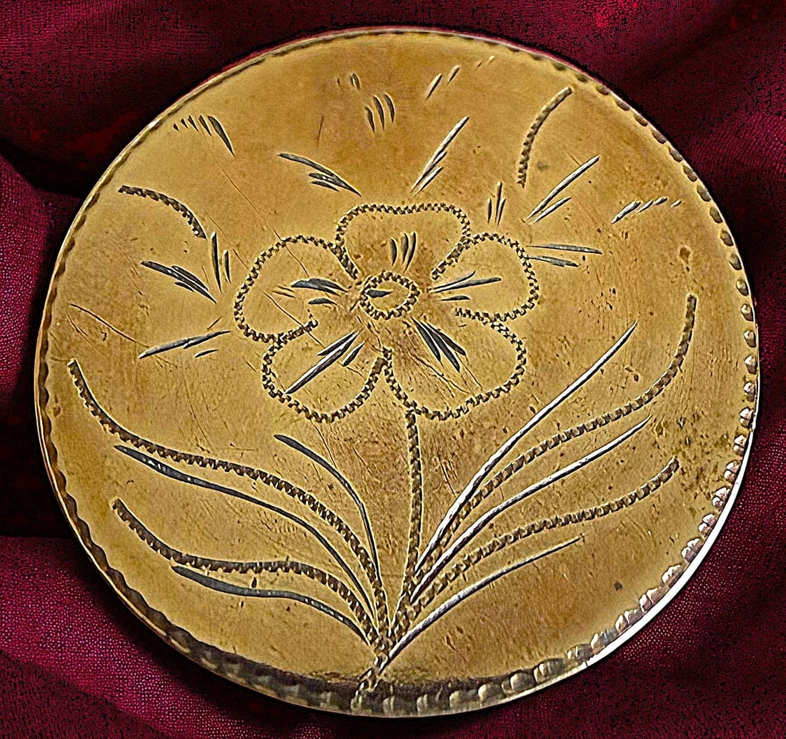 A DIVISION ONE ENGRAVED AND CHASED COPPER BUTTON: 1 Large medium 18th century beautifully crafted copper example. Here is a beautiful pictorial example depicting a large flower head and leaves finely engraved and chased detail especially for the age.