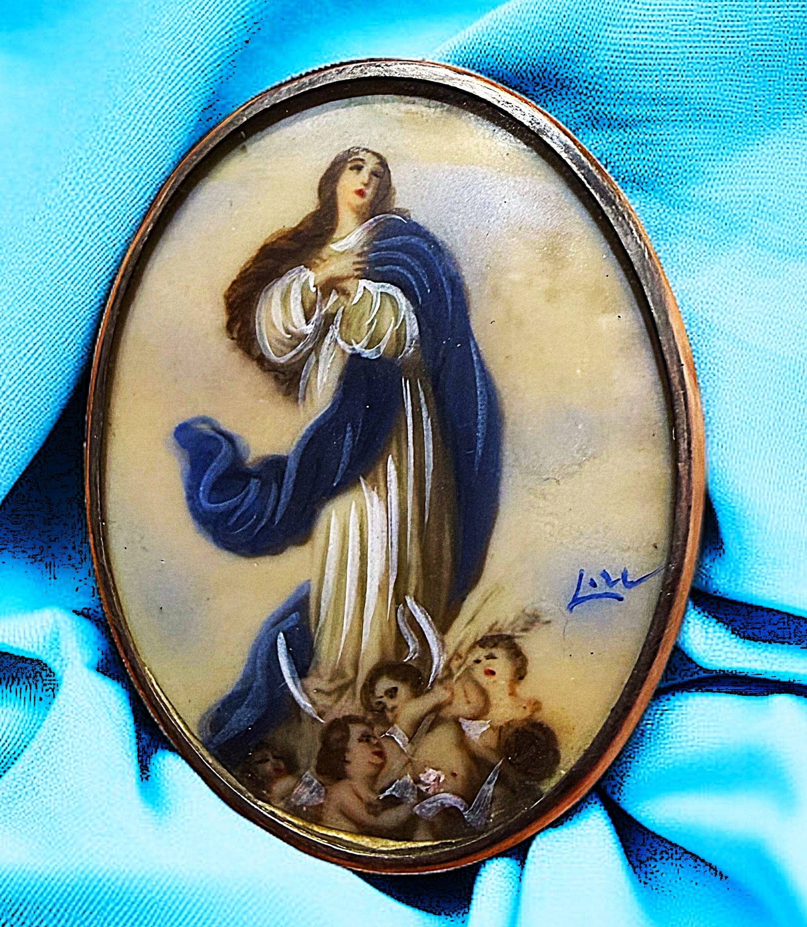 A DIVISION ONE HAND PAINTED FIGURAL BUTTON: 1 Large oval 19th century hand painted natural material example. This is a beautifully executed and colorful example set under glass and mounted in a silver setting. The button is also artist signed u