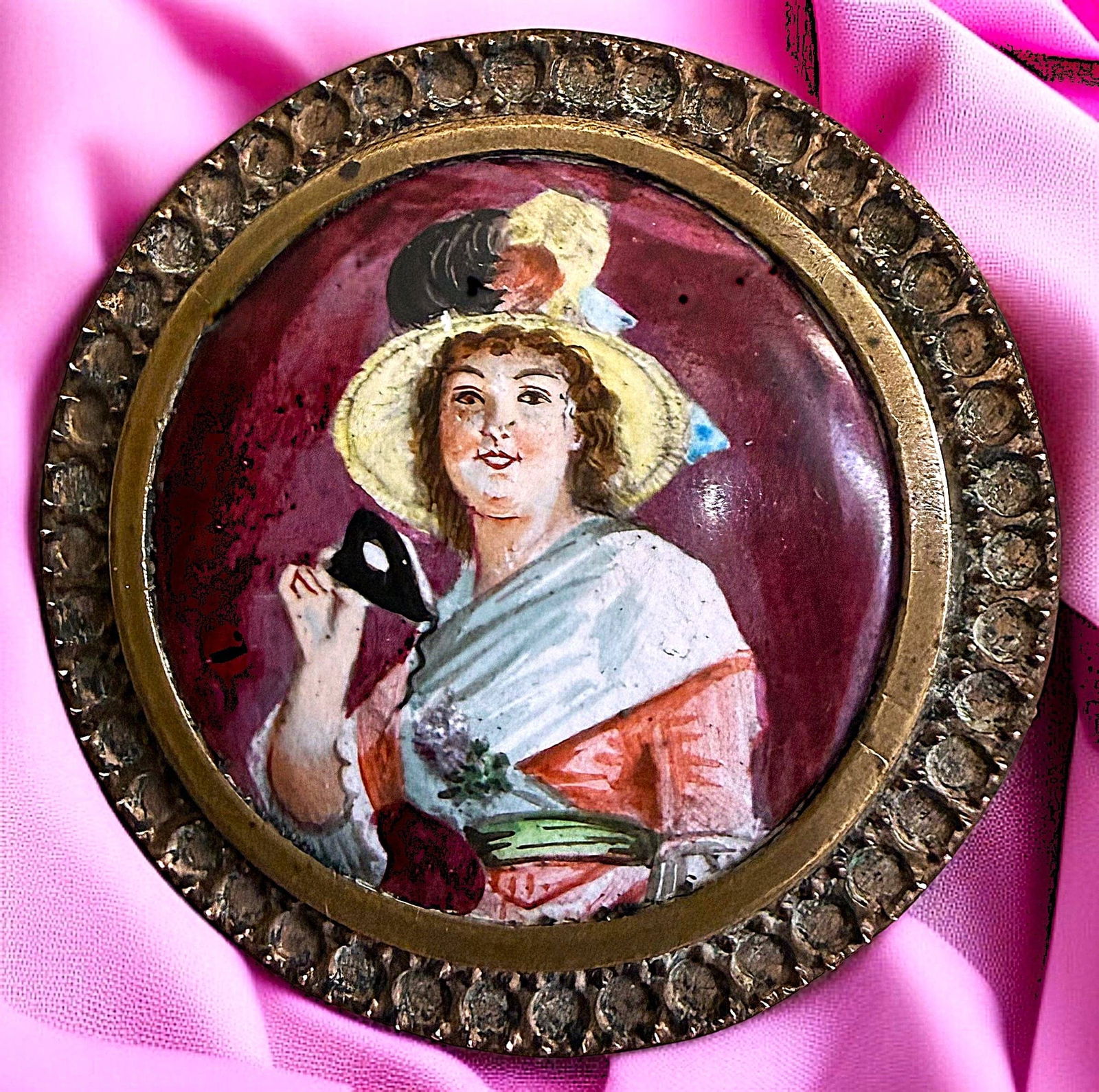 A DIVISION ONE HAND PAINTED PORCELAIN IN METAL BUTTON: 1 Large 19th century button "Going to a Masquerade Ball". Rarely does one find buttons showing people holding or wearing a mask for a masquerade. This very detailed and colorful example does just that