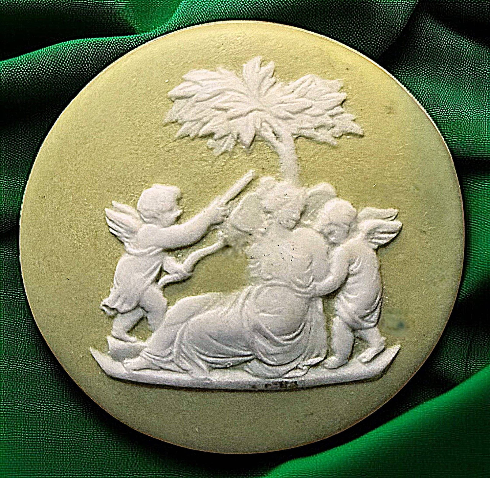 A DIVISION ONE PICTORIAL CERAMIC BUTTON: 1 Large 19th century backmarked Wedgwood example. Here is a color of genuine Wedgwood Jasperware that you do n to often see. This light color green was only made in buttons by the Wedgwood company for