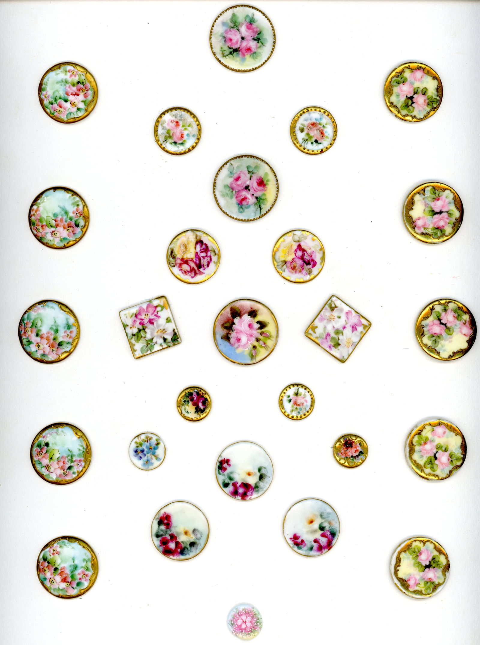 A CARD OF DIVISION ONE PORCELAIN STUD BUTTONS (1 of 4)