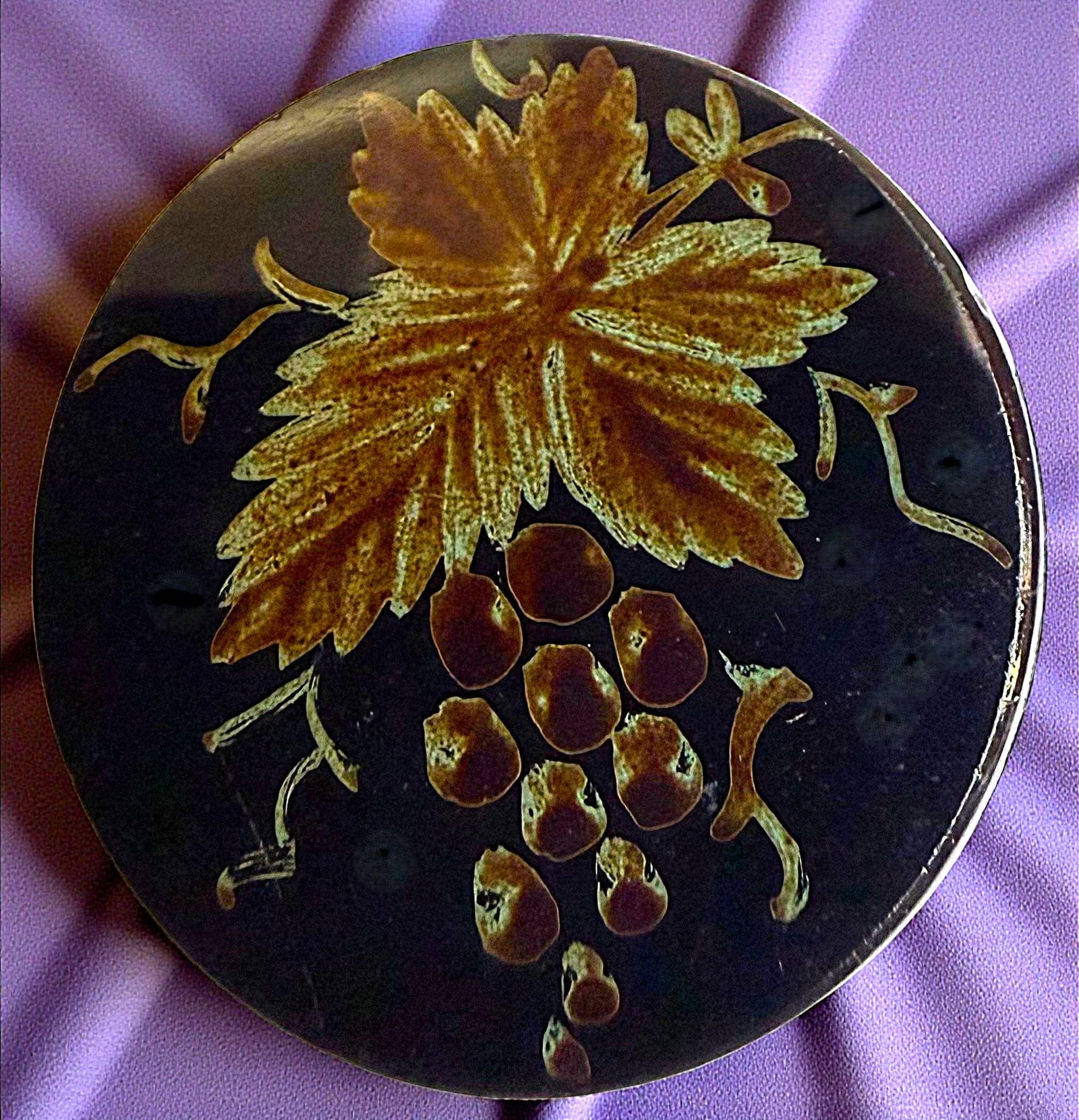 A SCARCE DIVISION ONE BLACK GLASS PICTORIAL BUTTON: 1 Large 19th century hand painted sheet overlay example. Here is a wonderful and scarce black glass button from the 19th century. The black glass base is hand painted in this case with grapes and leav