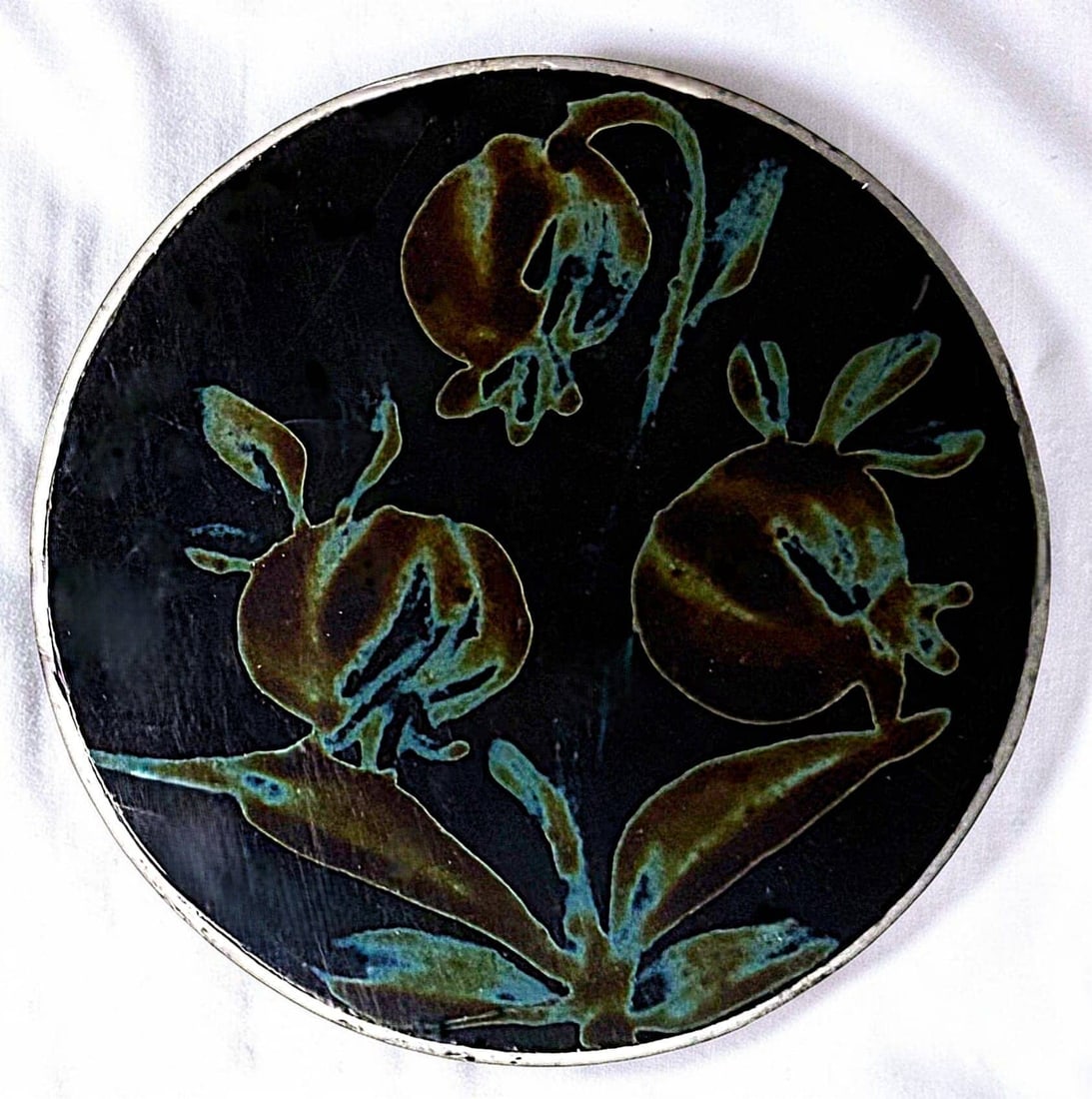 A SCARCE DIVISION ONE BLACK GLASS PICTORIAL BUTTON: 1 Small 19th century hand painted sheet overlay example. Here is a wonderful and scarce black glass button from the 19th century. The black glass base is hand painted in this case a group of Pomegrana