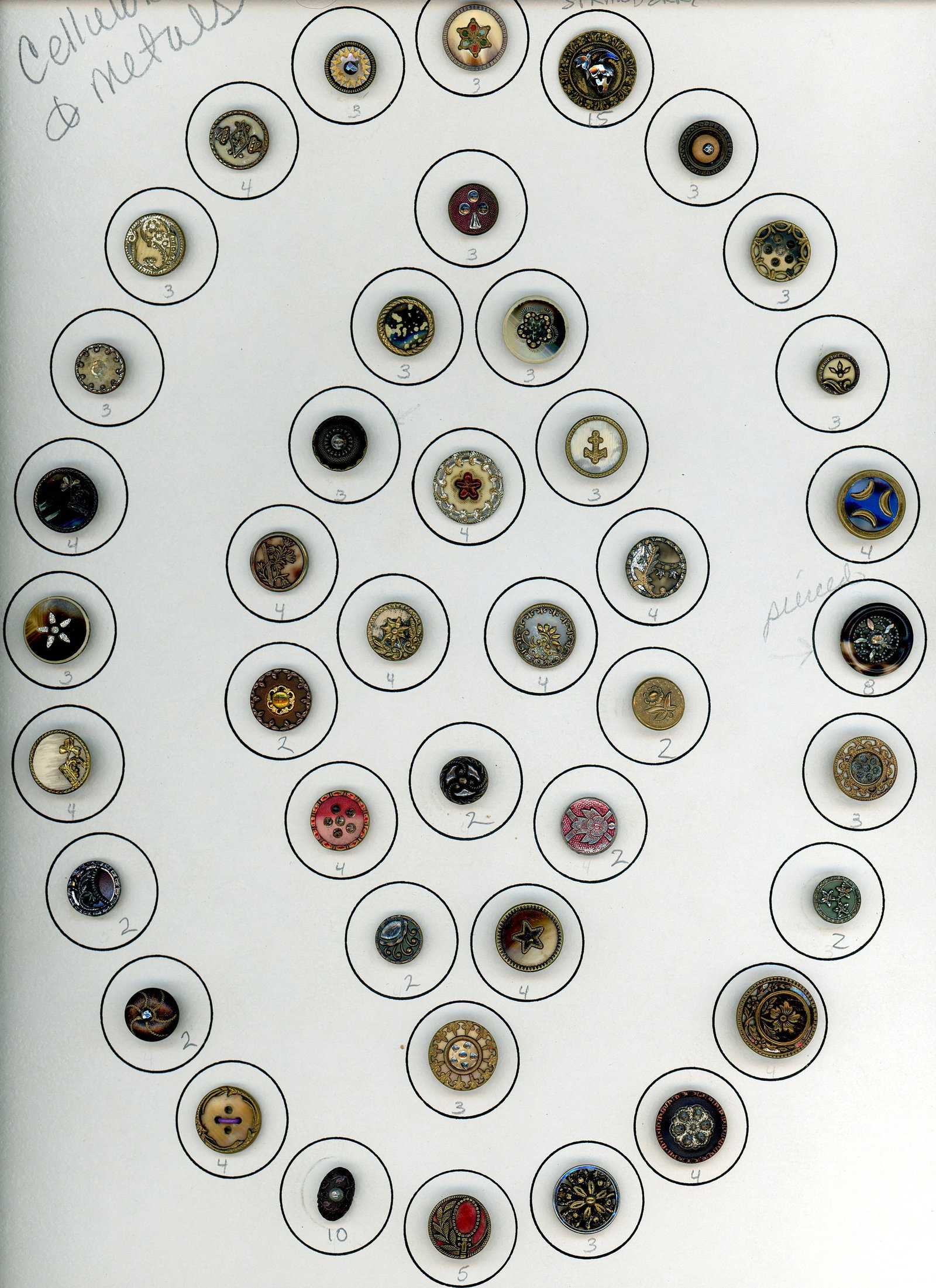 A CARD OF DIVISION ONE CELLULOID BUTTONS: 42 Small 19th century Victorian period metal examples. Here we have a card of desirable buttons from the 1890's Victorian era examples. Collectors and creators love these Victorian buttons utilizing c