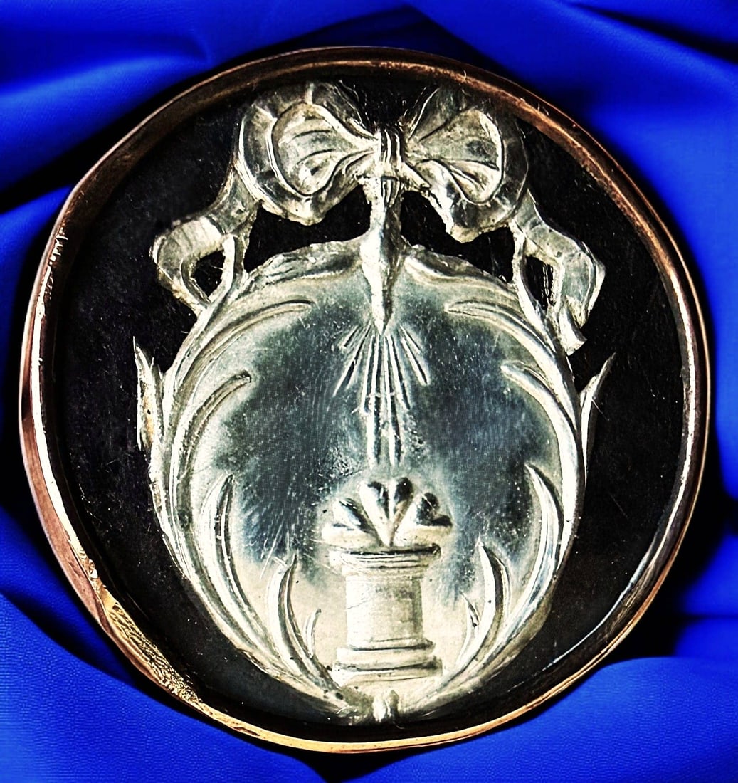 A RARE DIVISION ONE UNDER GLASS BUTTON: 1 Large 18th Century silver pictorial under glass button. This very fine and unusual example of 18th century craftsmanship shows an embossed thick foil design under glass. We have had another example