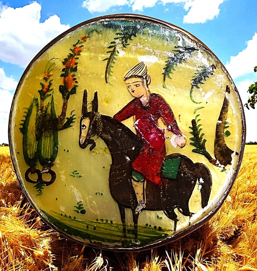 A DIVISION THREE PERSIAN PEARL BUTTON: 1 Medium 1930's hand painted shell side saddle rider example. This button was hand painted in Persia around the 1930's and they were lacquered over the paintings. The painting was done on a thick pear
