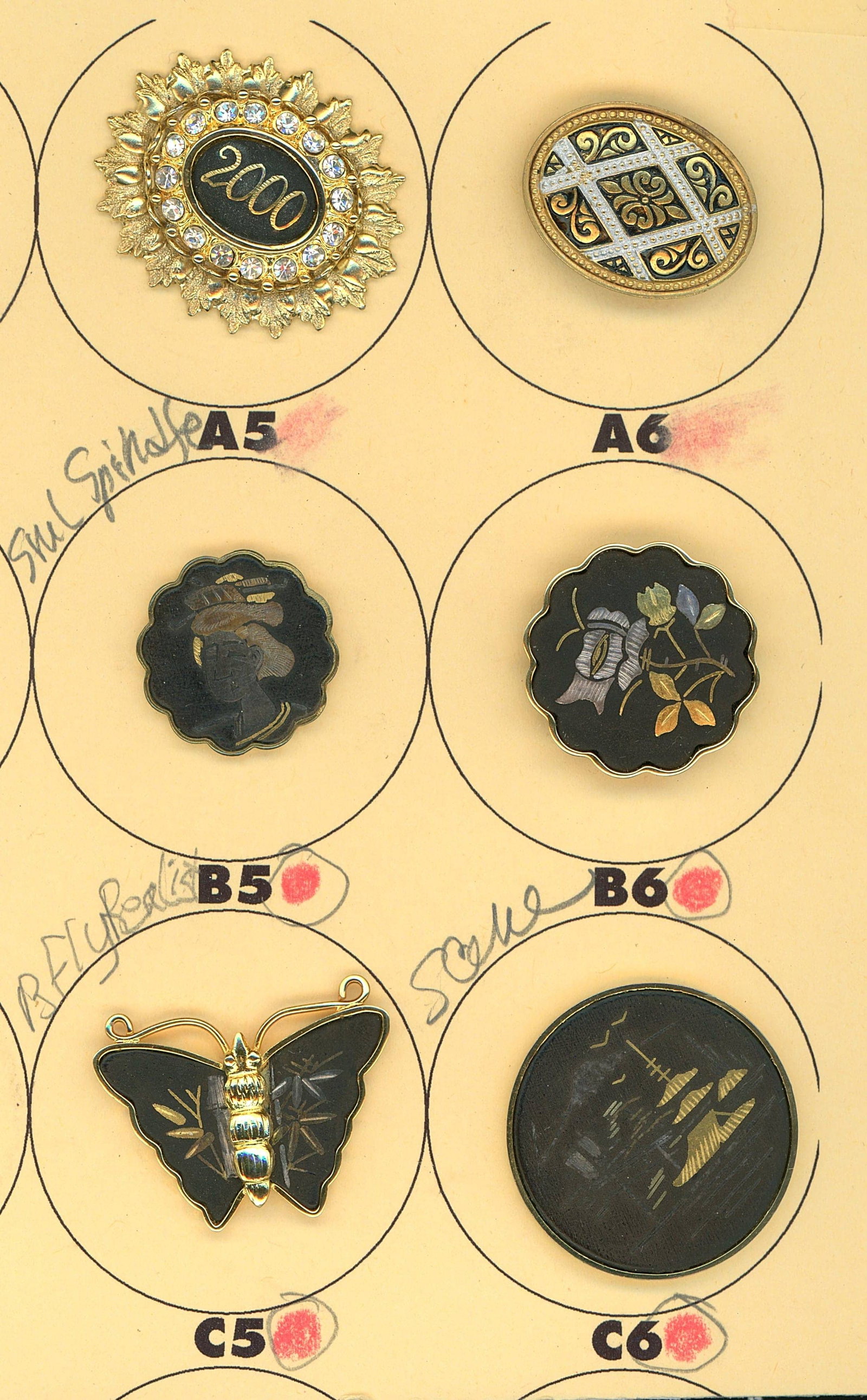 A SMALL CARD OF DIVISION THREE DAMASCENE BUTTONS: 6 Medium 20th century examples including vintage and studio. This lot includes some nice old examples along with an example made by the studio artist Mario Ballesteros in commemoration of the upcoming