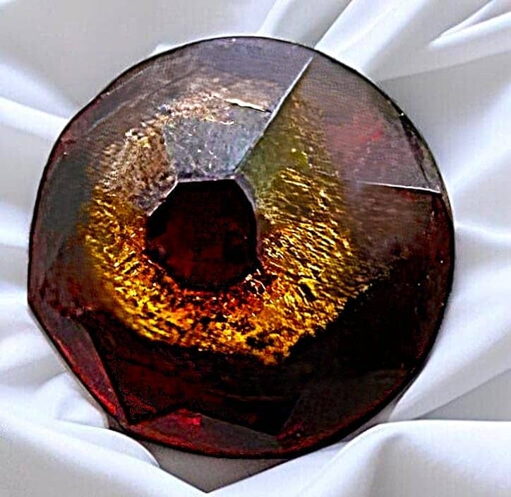 A RARE DIVISION ONE GLASS REALISTIC SHAPE BUTTON: 1 Small 19th century Tingue button in a bell shape. Tingues are a desirable technique in glass buttons by collectors but rarely do we see this realistic shaped example in the shape of a bell. In this