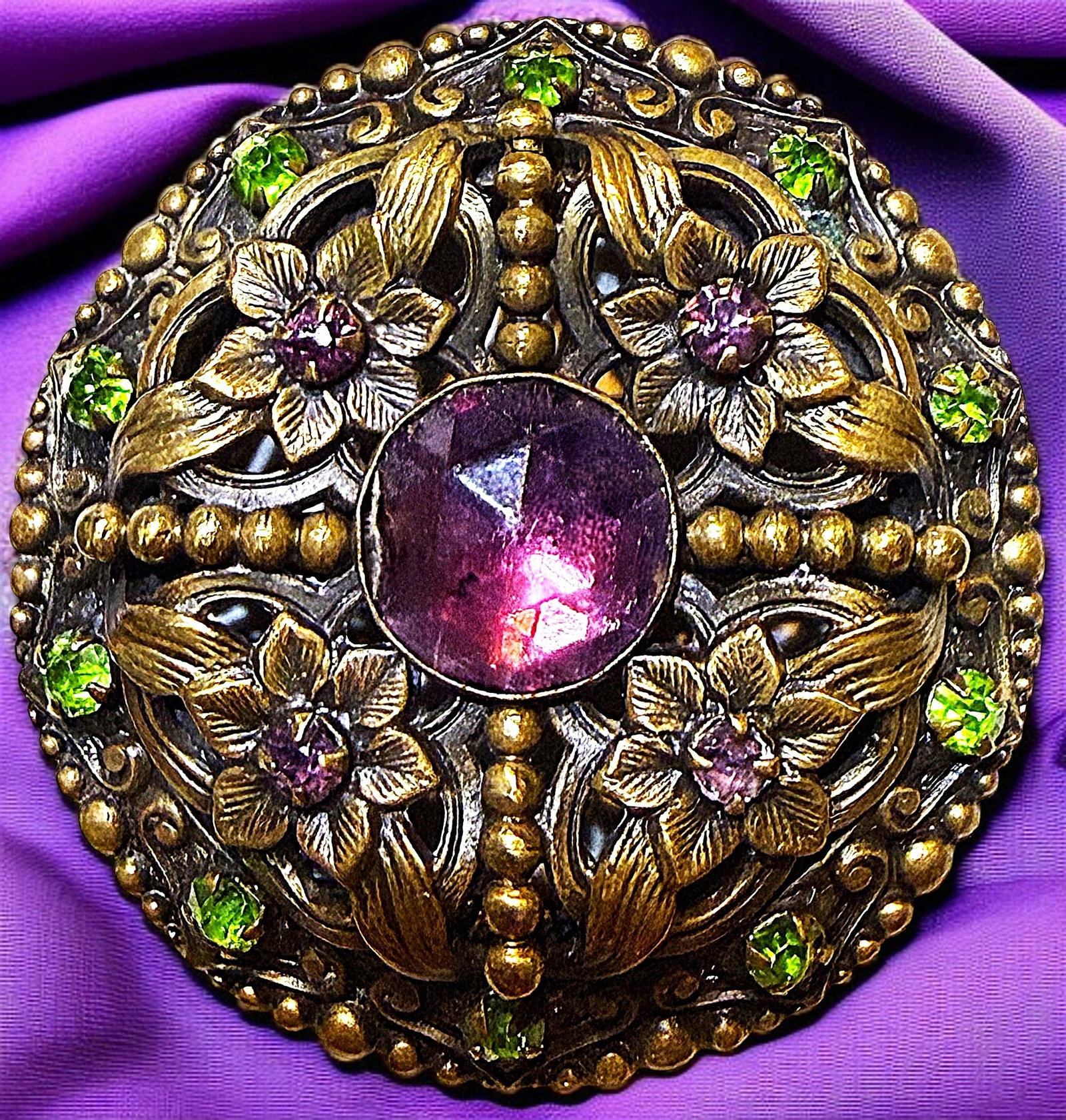 A DIVISION ONE VICTORIAN JEWELED BUTTON: 1 Large 19th century Fabulous pierced brass GAY 90 example. Here is a lovely example of genuine Gay 90 jeweled button from the 1890's. The pierced ornate brass example is centered with a faceted round