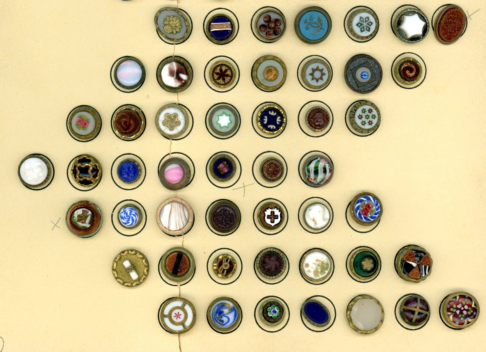 A CARD OF DIVISION ONE GLASS IN METAL BUTTONS: 49 Small 19th century assorted "Waistcoat " style examples. Here is a large and nice variety of colors, patterns, designs and more in these what collectors used to call Waistcoat buttons including Che