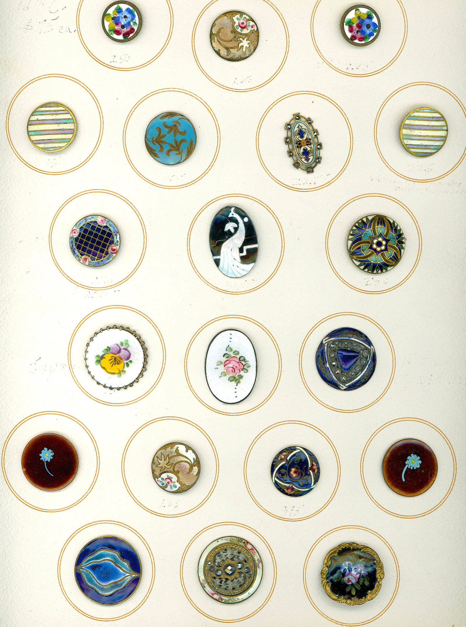 A CARD OF DIVISION ONE AND THREE ENAMEL BUTTONS: 20 Medium/Large 19th/20th century examples including pictorial. This card includes a wonderful oval Peacock example, a couple of floral basse taille examples, champleve and more. A nice card of