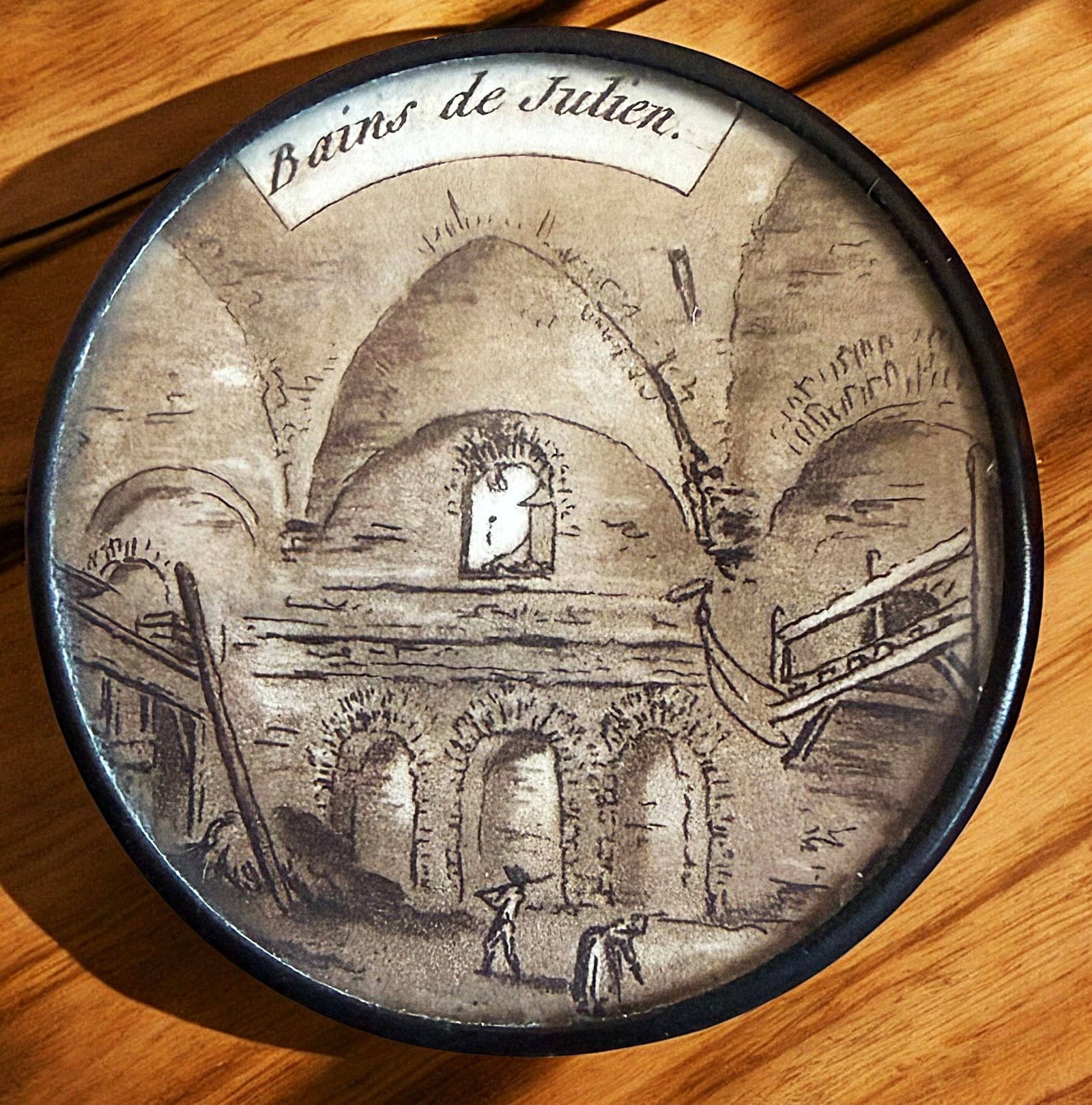 A SCARCE DIVISION ONE UNDER GLASS BUTTON: 1 Large 18th century sepia architectural scene example. Buttons from the 18th century with interior designs are much less common than those of the exteriors. This example in sepia tones set under glas