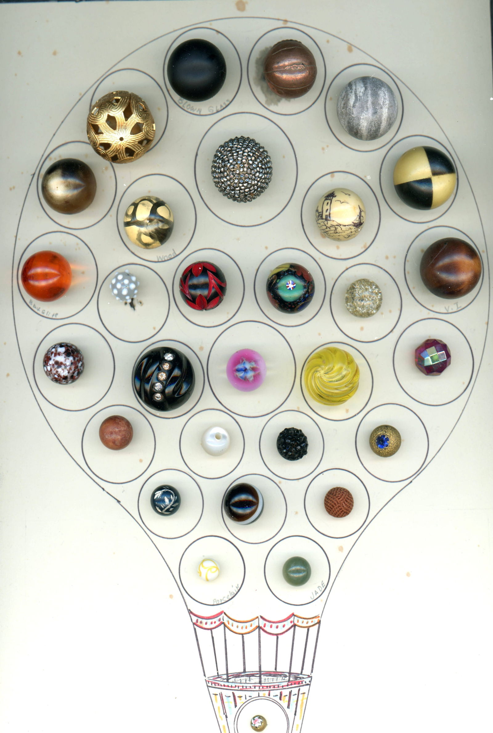 A CARD OF DIVISION ONE AND THREE BALL SHAPED BUTTONS (1 of 5)