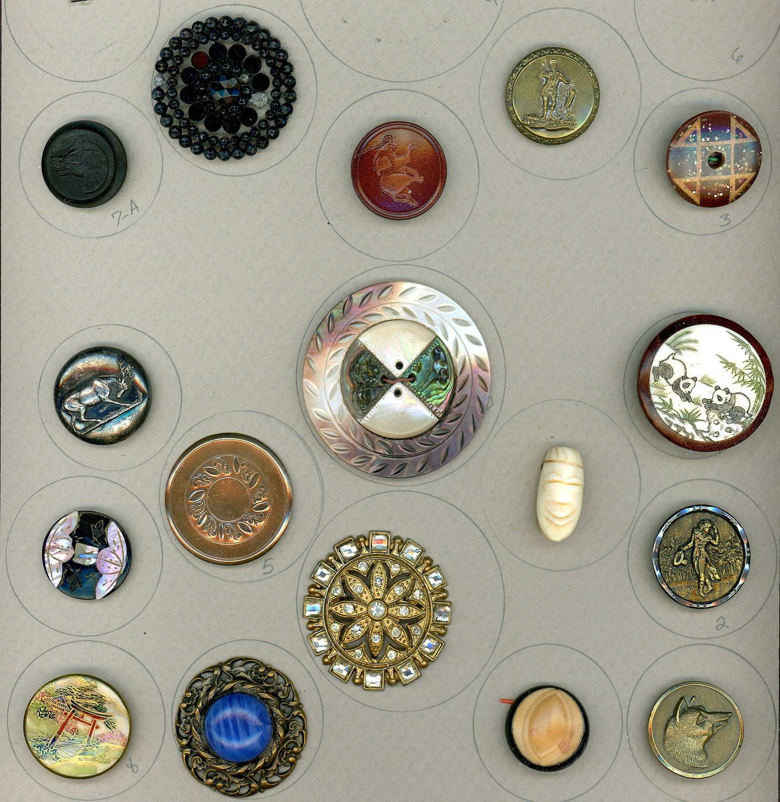 A PARTIAL CARD OF DIV. & 3 ASSORTED MATERIAL BUTTONS: 17 Medium/Large 18th-20th century examples. This partial card includes a nice engraved 18th century copper, a beautiful marquetry style big pearl with abalone, Japanese Satsuma, a lovely blue cabochon