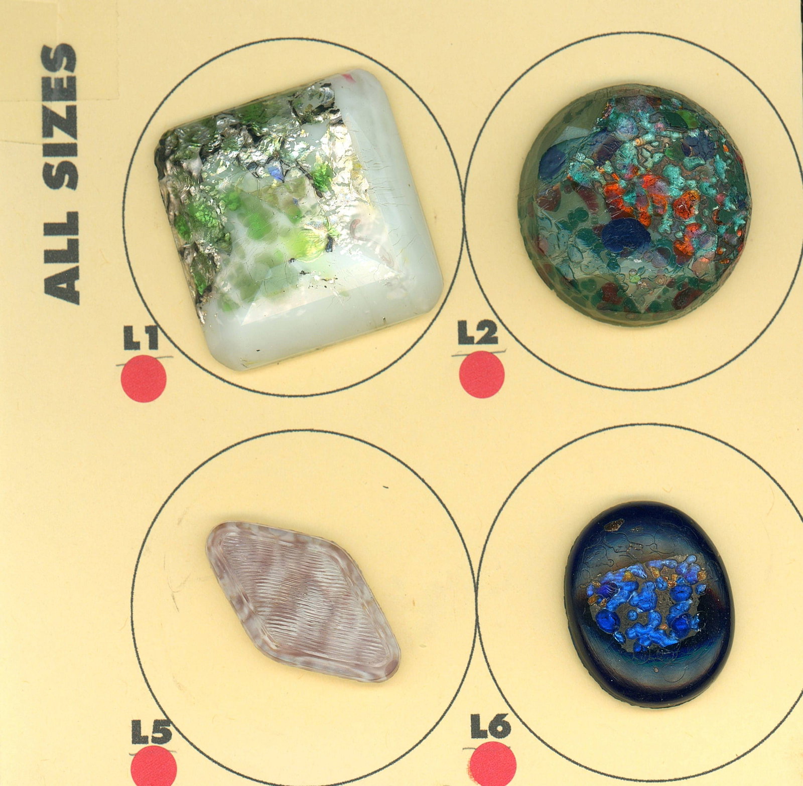 A PARTIAL CARD OF DIVISION ONE GLASS BUTTONS (1 of 4)