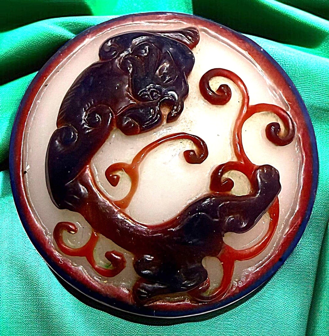 A DIVISION THREE CARVED GLASS BUTTON (1 of 3)