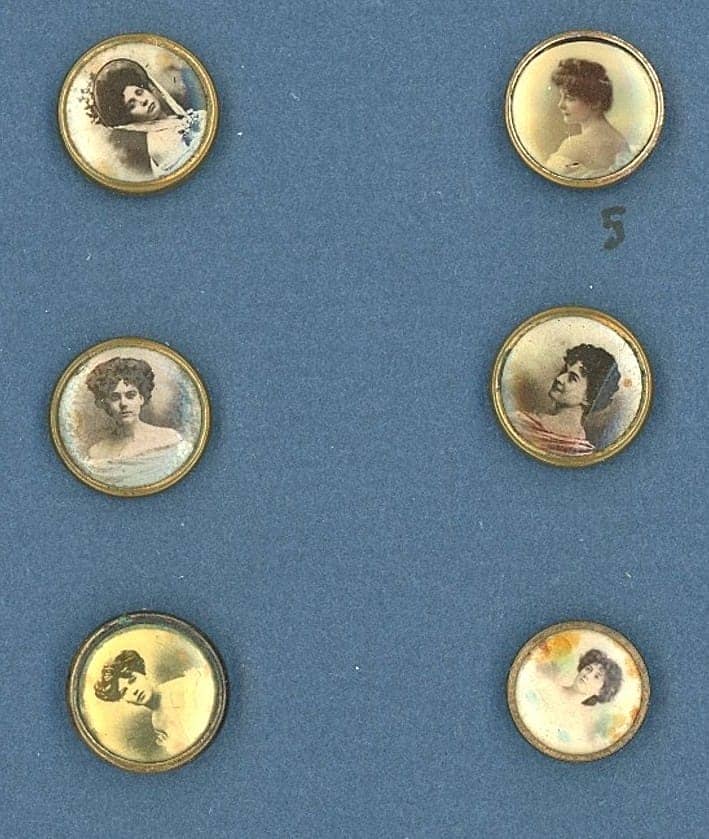 A SMALL CARD OF DIVISION ONE LITHO BUTTONS: 6 Small 19th century examples in the Birmingham trade style. This small card is for those buttons that are similar to the mountings used on Birmingham trade buttons and are centered with a lithograph