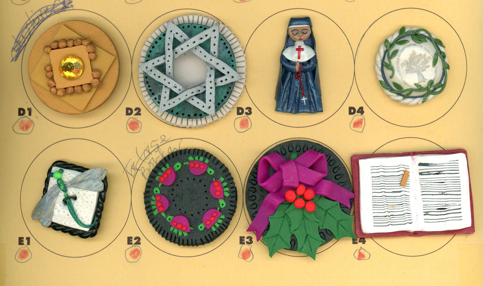 A PARTIAL CARD OF DIVISION THREE STUDIO BUTTONS (1 of 5)