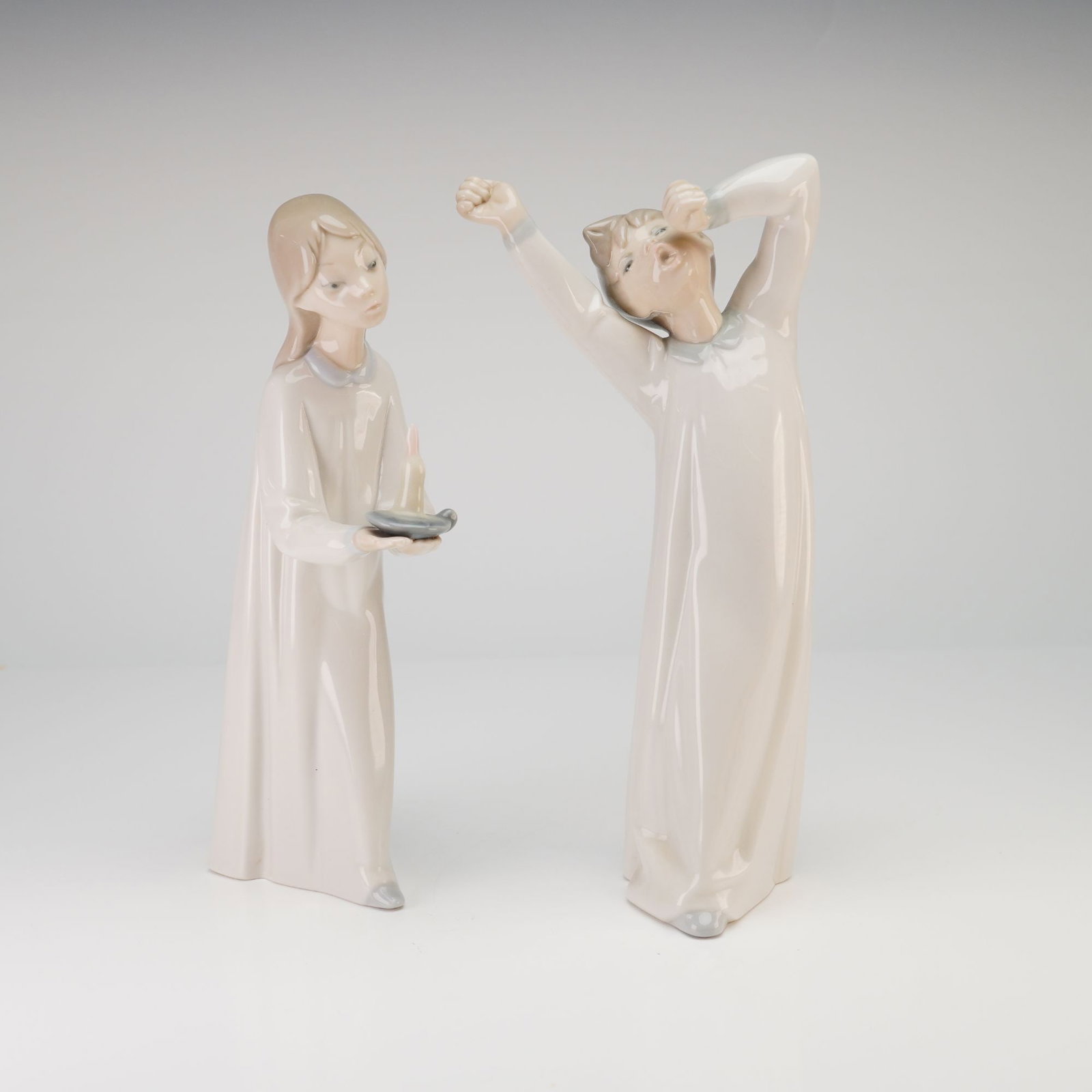 Lladró Figurines, Girl with Candle 01004868 and Boy Yawning 01004870 (1 of 3)