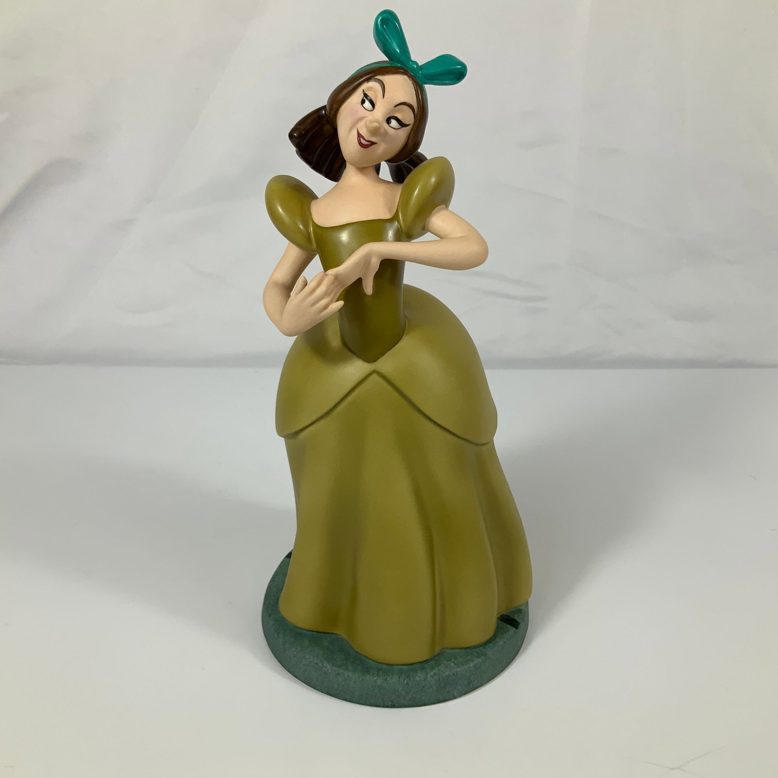 Walt Disney Classics Collection Cinderella Dreadful Drizella 50th Anniversary Figurine: A Walt Disney Classics Collection (WDCC) hand-painted porcelain dfig figurine titled Dreadful Drizella, created to commemorate the 50th anniversary of the animated feature Cinderella. The figure depic