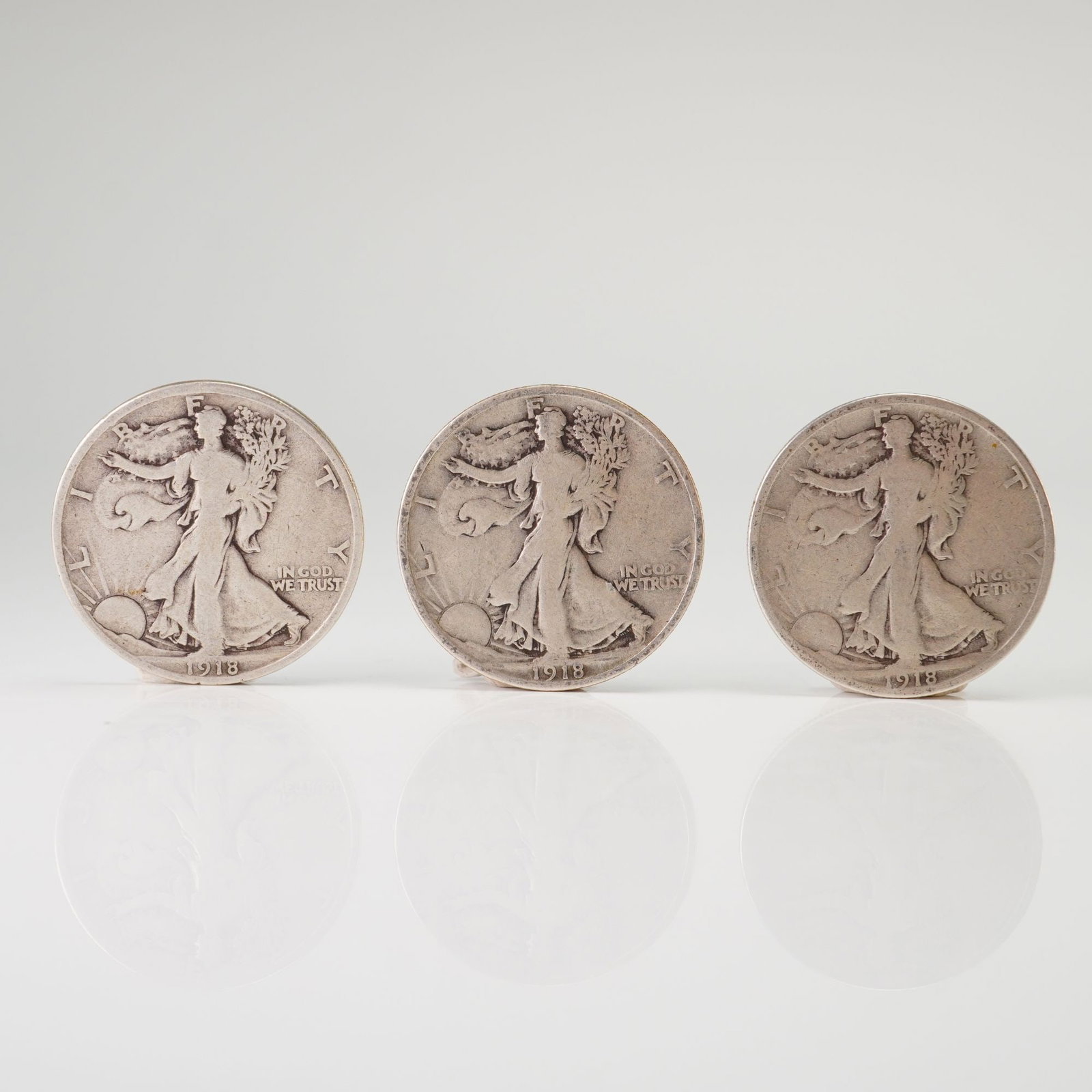 3pc 1918 Walking Liberty Half Dollar Silver Coins: This collection features three 1918 Walking Liberty Half Dollars: one minted in Denver (D), one in San Francisco (S), and one from Philadelphia (no mint mark). Coins struck at the Philadelphia Mint fr