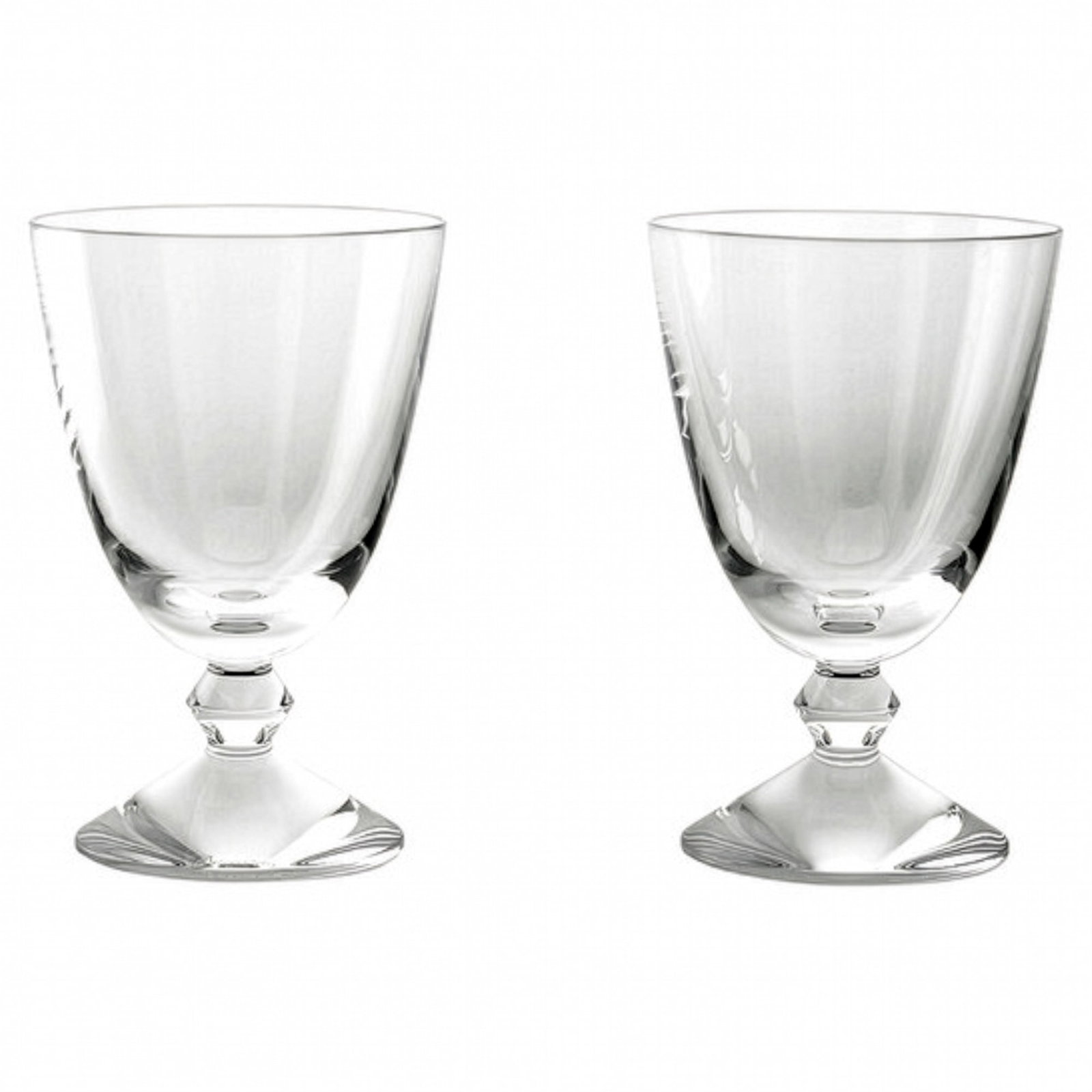 Pair of Baccarat Vega Small Clear Crystal Glasses, Sealed Box: This lot features a pair of Baccarat lead crystal glasses from the Vega collection. The items are housed in the original red manufacturer presentation box. The label on the reverse identifies the patt