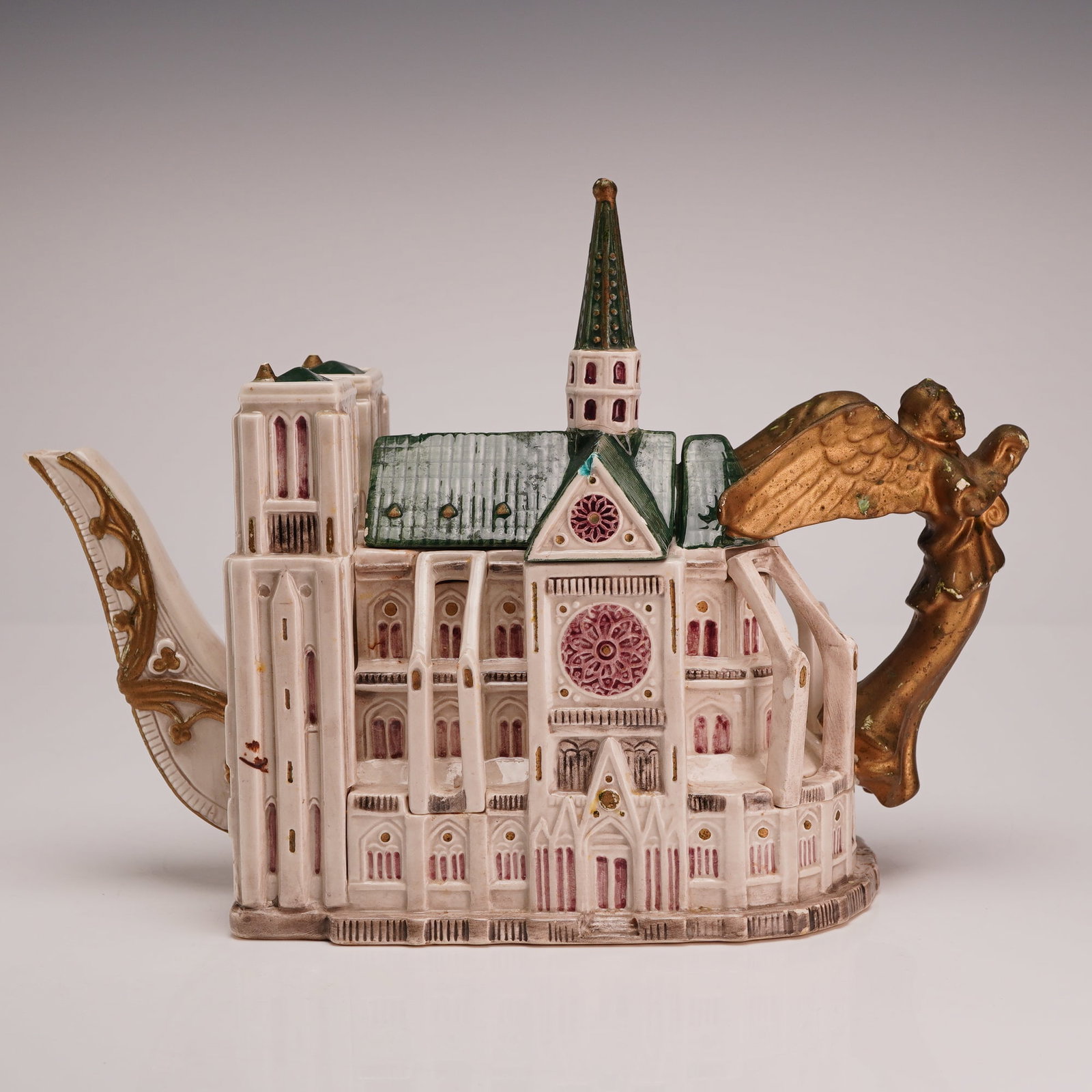 Fitz and Floyd Places of Worship Limited Edition Notre Dame Cathedral Teapot 1995: This Fitz and Floyd figural teapot is part of the Places of Worship Collector's Series and is modeled after the Notre Dame Cathedral in Paris, France. Produced in 1995, this limited edition piece is c