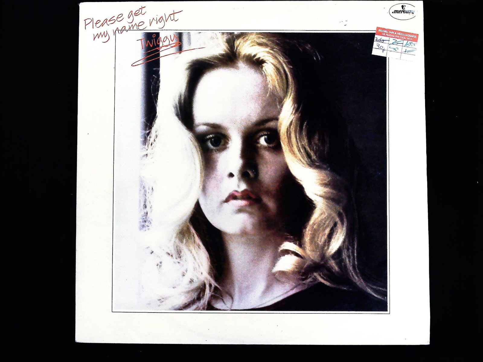 Twiggy Please Get My Name Right 1977 UK Vinyl LP: A vintage 12-inch black vinyl LP record album, Twiggy's 1977 release titled Please Get My Name Right. The album was issued by Mercury/Phonogram Ltd. with the catalog number 9102 601 (UK pressing). The