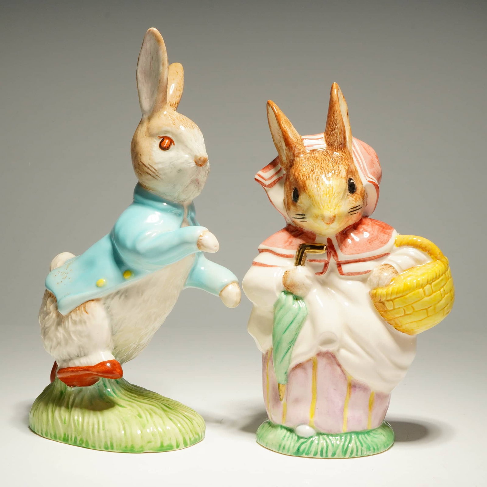 A Pair of Beswick Beatrix Potter Figurines: Limited Edition Mrs. Rabbit and Peter Rabbit (1 of 3)