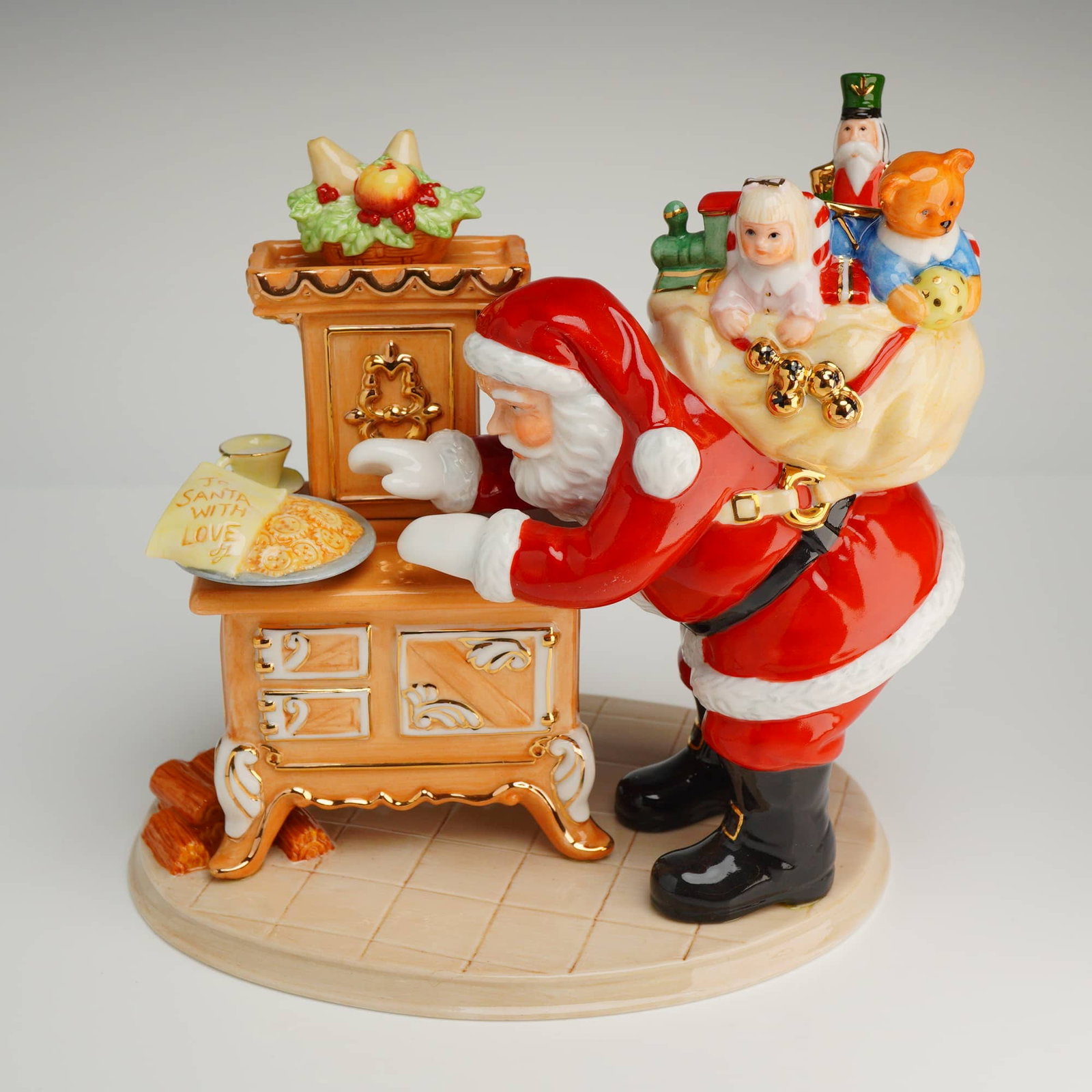 Royal Doulton Figurine Cookies For Santa HN 4946: A porcelain figurine manufactured by Royal Doulton, titled "Cookies For Santa," HN 4946, part of the Holiday Traditions Collection. The piece is a limited edition, numbered 2327/5000, and dated 2006.