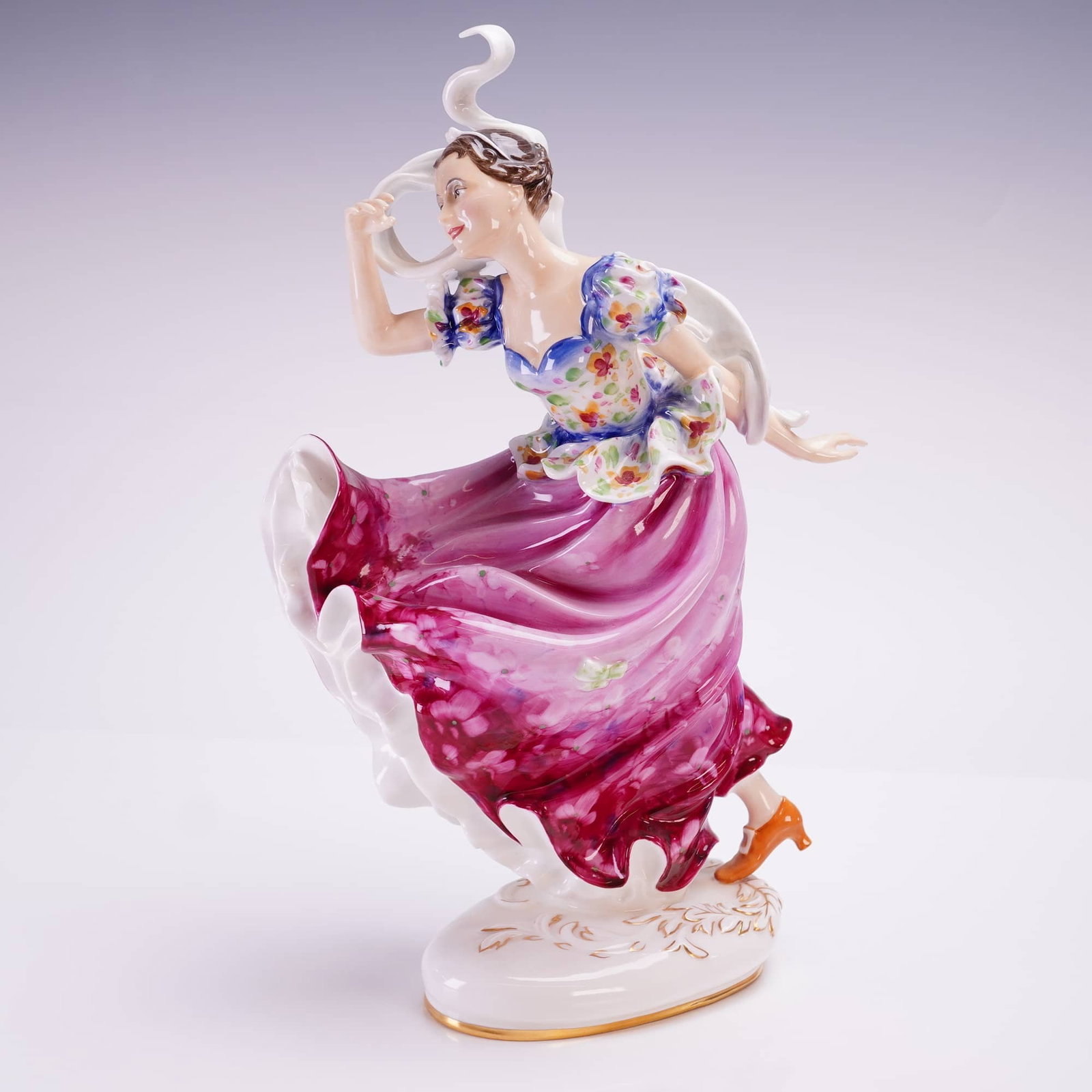 Royal Doulton Prestige Figurine Columbine HN2738: A Royal Doulton bone china figurine titled Columbine, model HN2738, from the Prestige Collection. The figure depicts a female dancer in a mid-motion pose, hand-decorated with a floral bodice and a vol