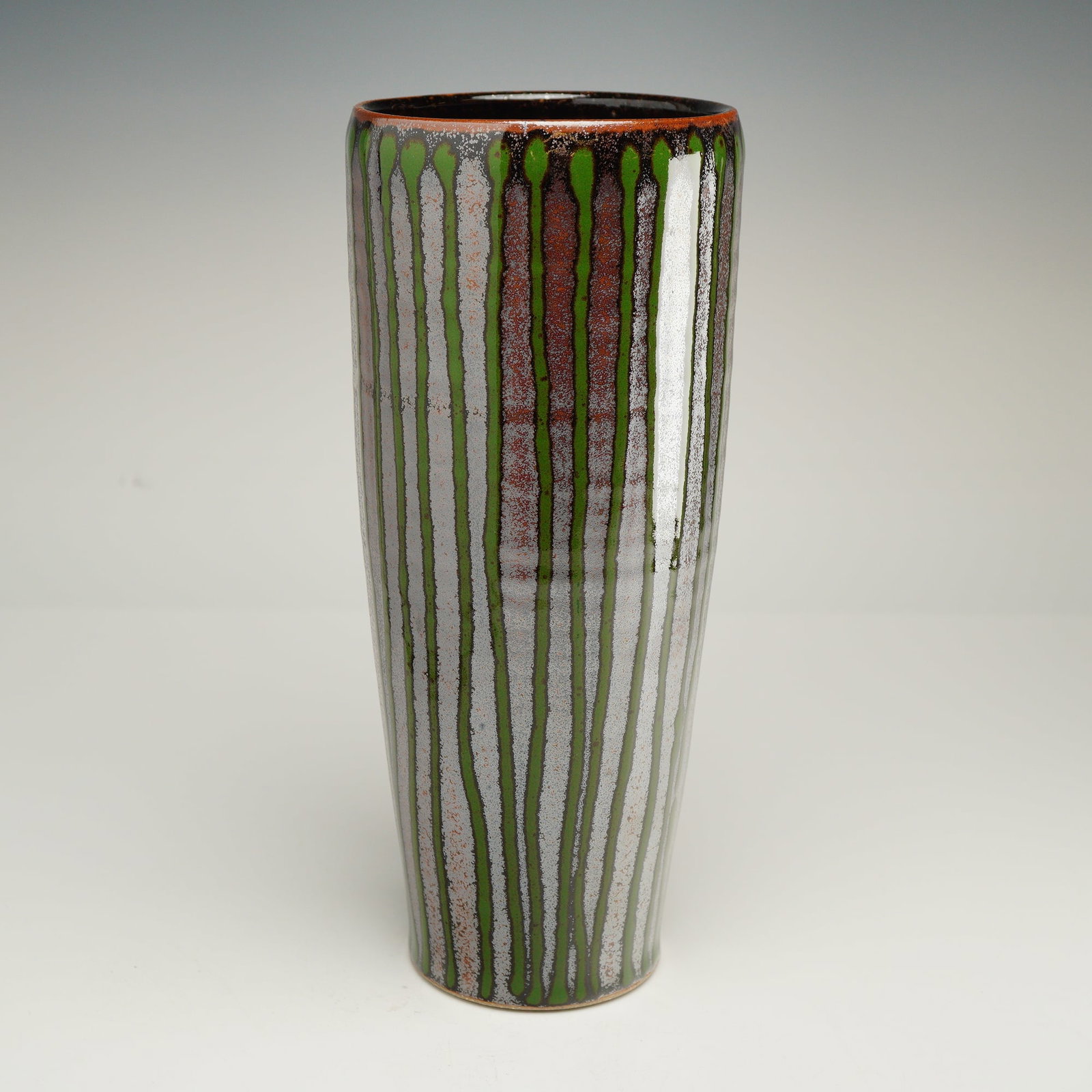 Jeff Dean Studio Pottery Vase: Tall and elegant studio pottery vase by North Carolina potter Jeff Dean of Seagrove, NC; a region nationally recognized for its rich and continuous pottery tradition. This hand-thrown form features a