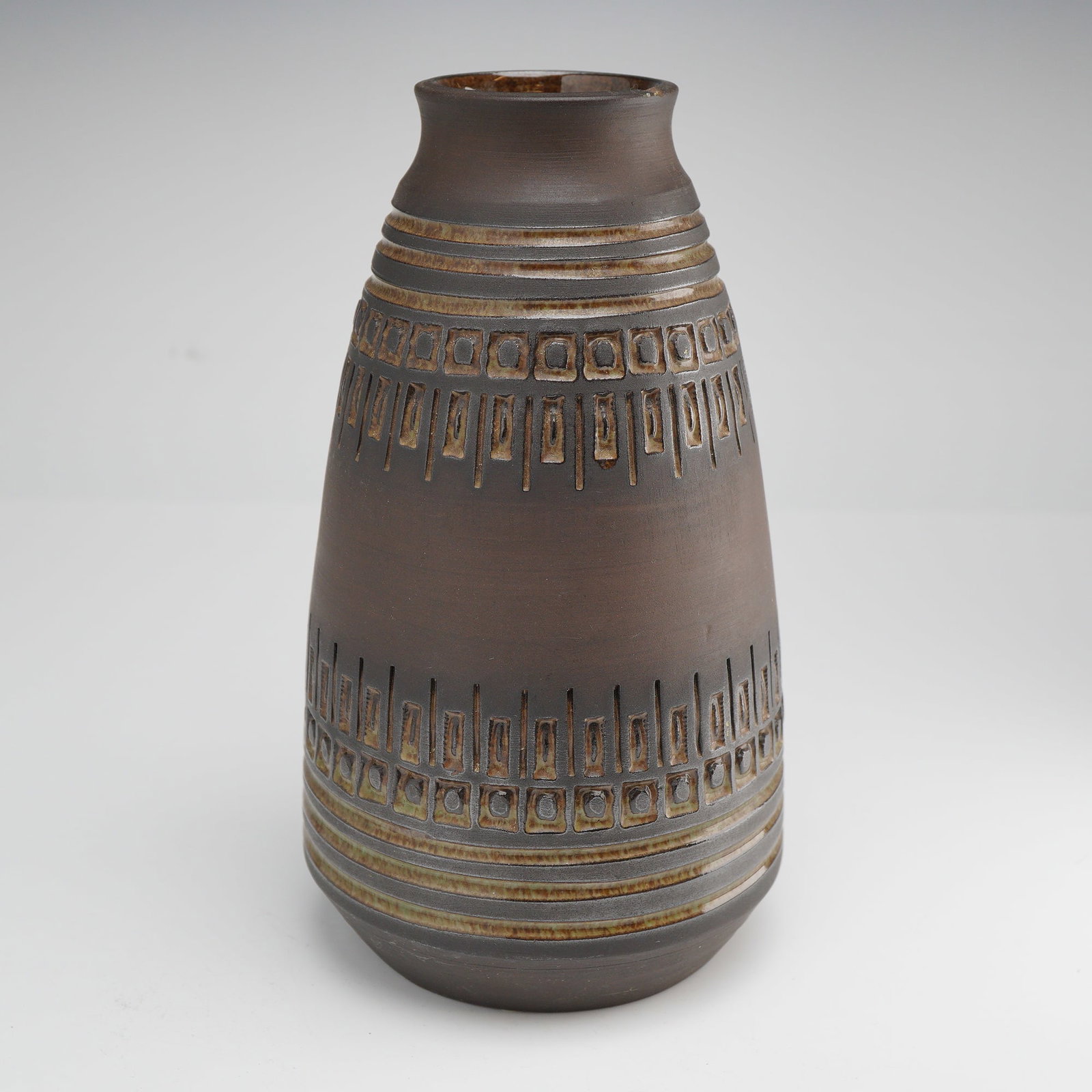 Ulla Winblad for Alingsas Keramik Mid-Century Modern Swedish Stoneware Vase: Wheel-thrown stoneware vase of tapered baluster form by Ulla Winblad for Alings?s Keramik. The surface is finished in a matte chocolate-brown glaze, accented with banding encircling the shoulder and l
