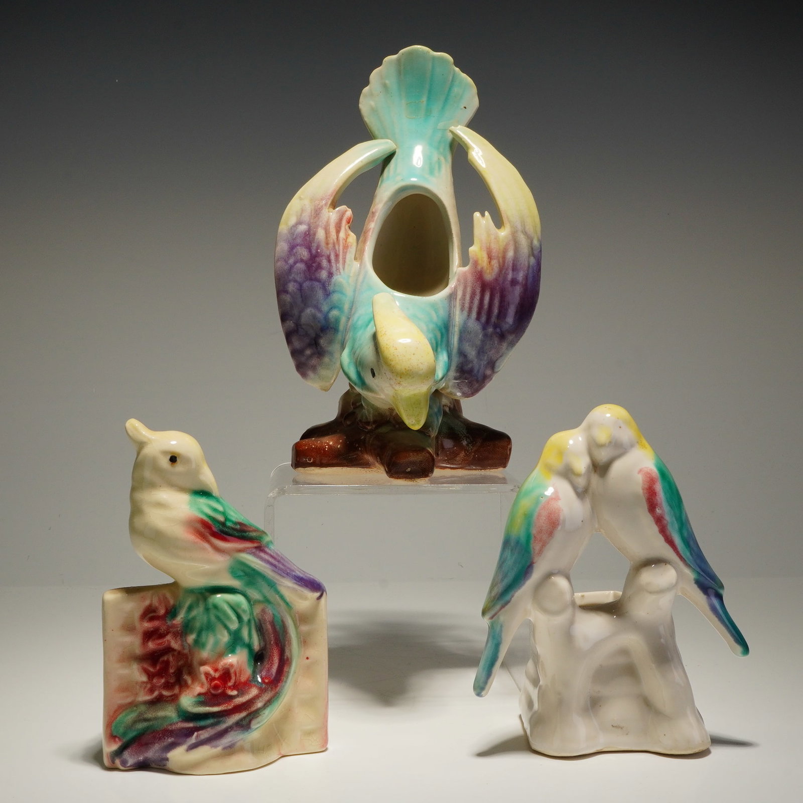 3pc Morton Pottery Ceramic Bird Planters: This collection of three vintage Morton Pottery ceramic bird planters reflects the mid-century modern aesthetic of the 1950s. The group consists of a large central planter with a bird in an upraised w