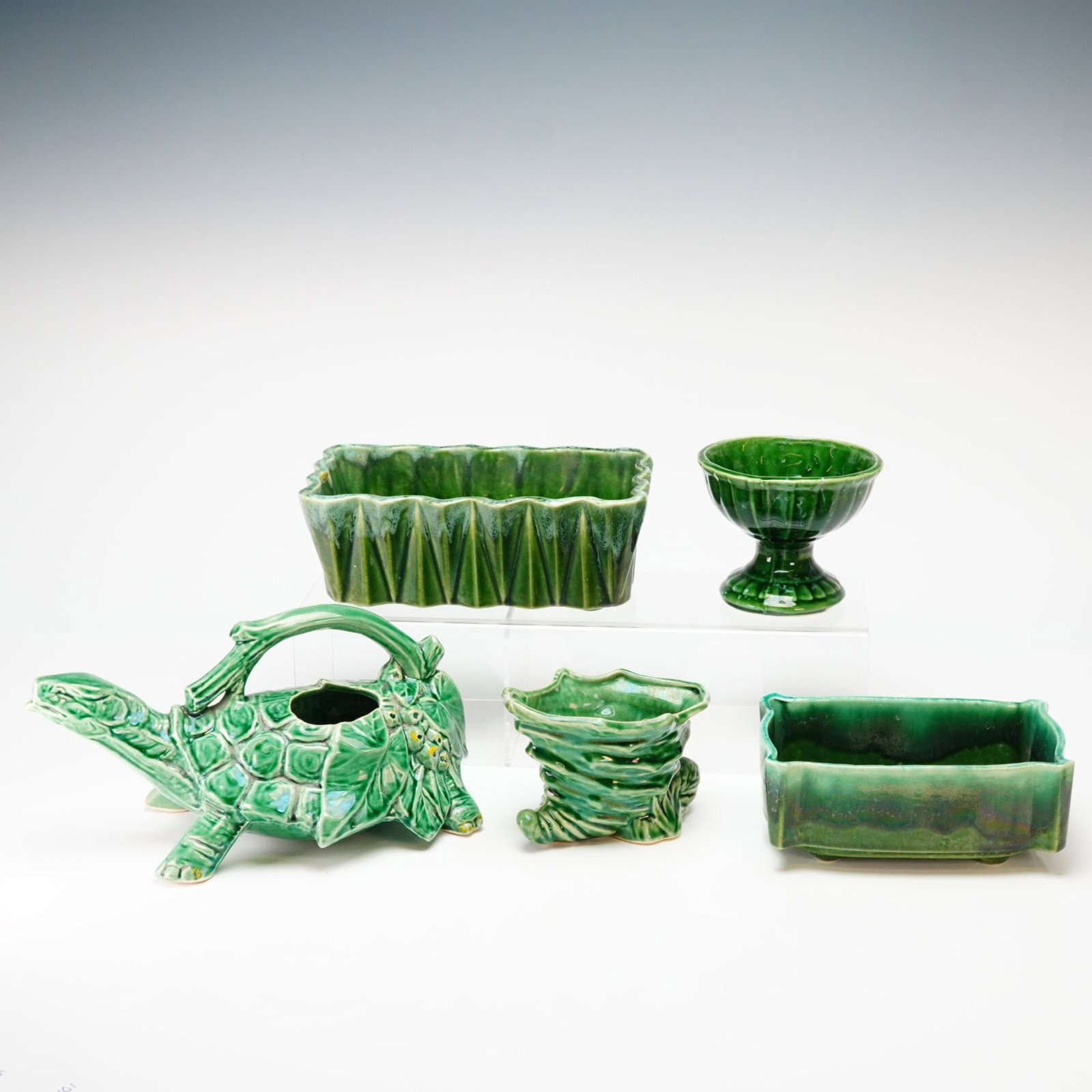 5pc McCoy and UPCO Green Ceramic Bowls and Turtle Teapot: This 5pc collection of McCoy and UPCO green ceramic bowls and turtle teapot features mid-century American art pottery finished in a vibrant green high-gloss glaze. The group includes a figural turtle