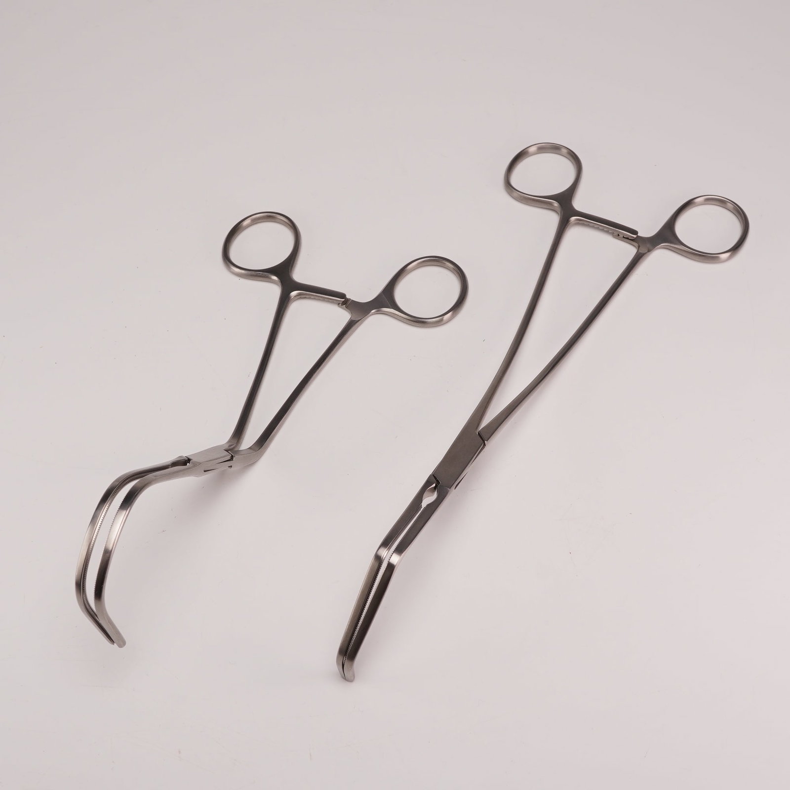 Two SSI Ultra Stainless-Steel Surgical Clamps (1 of 3)