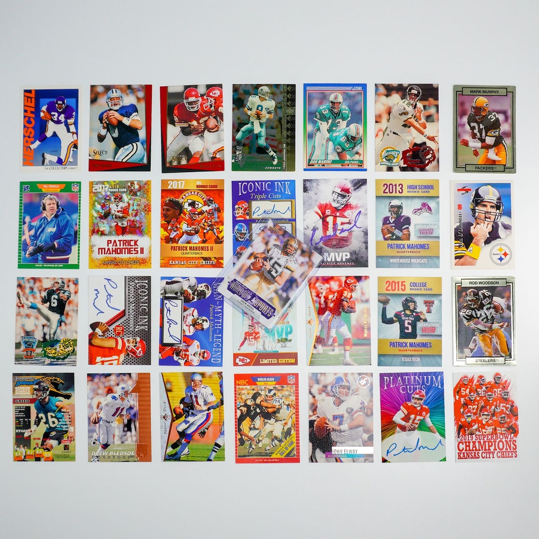 A Collection of 29pc Football Collector Cards Including Pro Set and Upper Deck: This collection of 29pc football collector cards features issues from Pro Set and Upper Deck, as well as Stadium Club and Score. The lot includes trading cards depicting various NFL players and coache