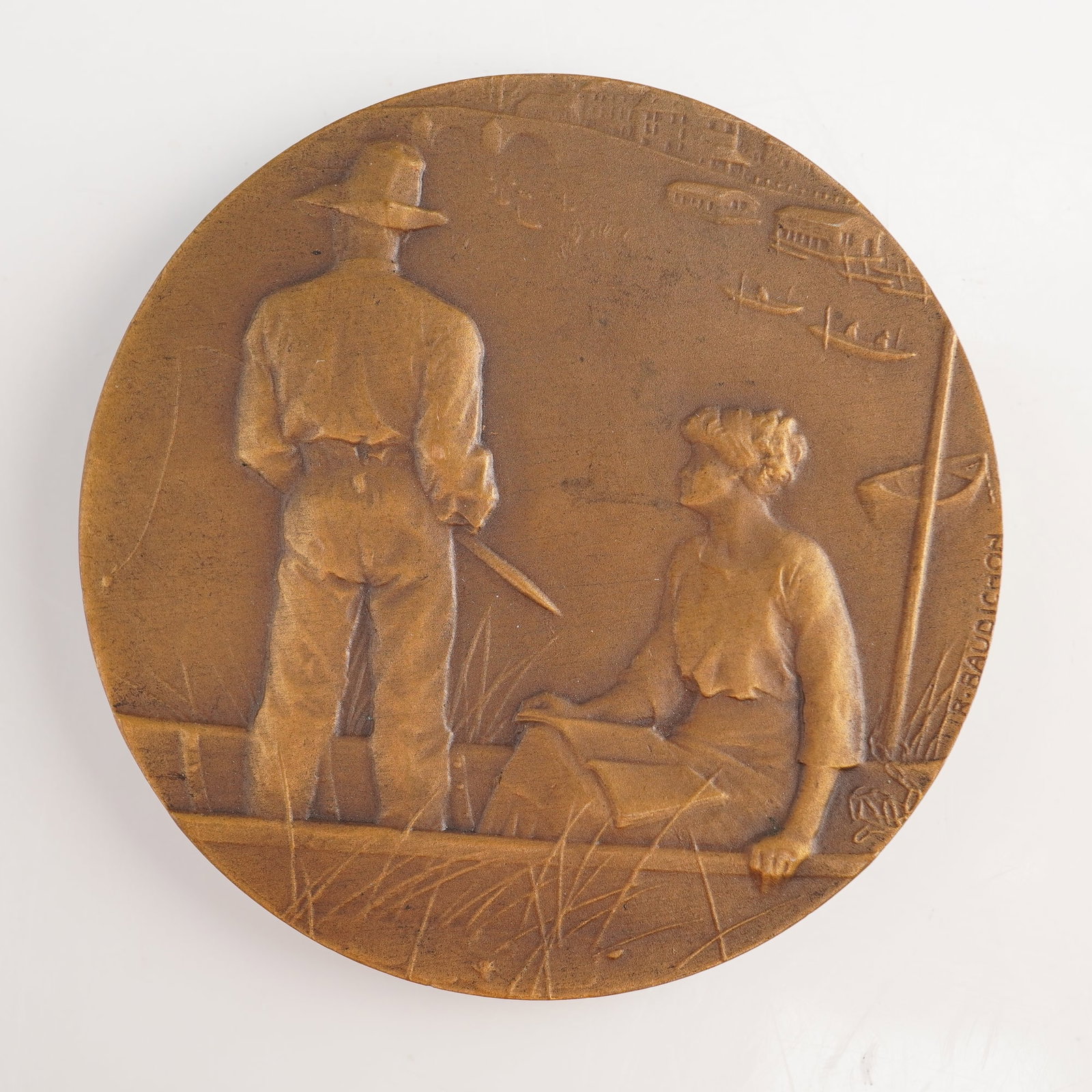 French Art Nouveau Bronze Medal Peche a la Ligne by Rene Baudichon: This circular bronze art medal was designed by the renowned French medalist Rene Baudichon (1878–1963). Titled Peche a la Ligne (Angling), the piece is executed in the late Art Nouveau style. The ob