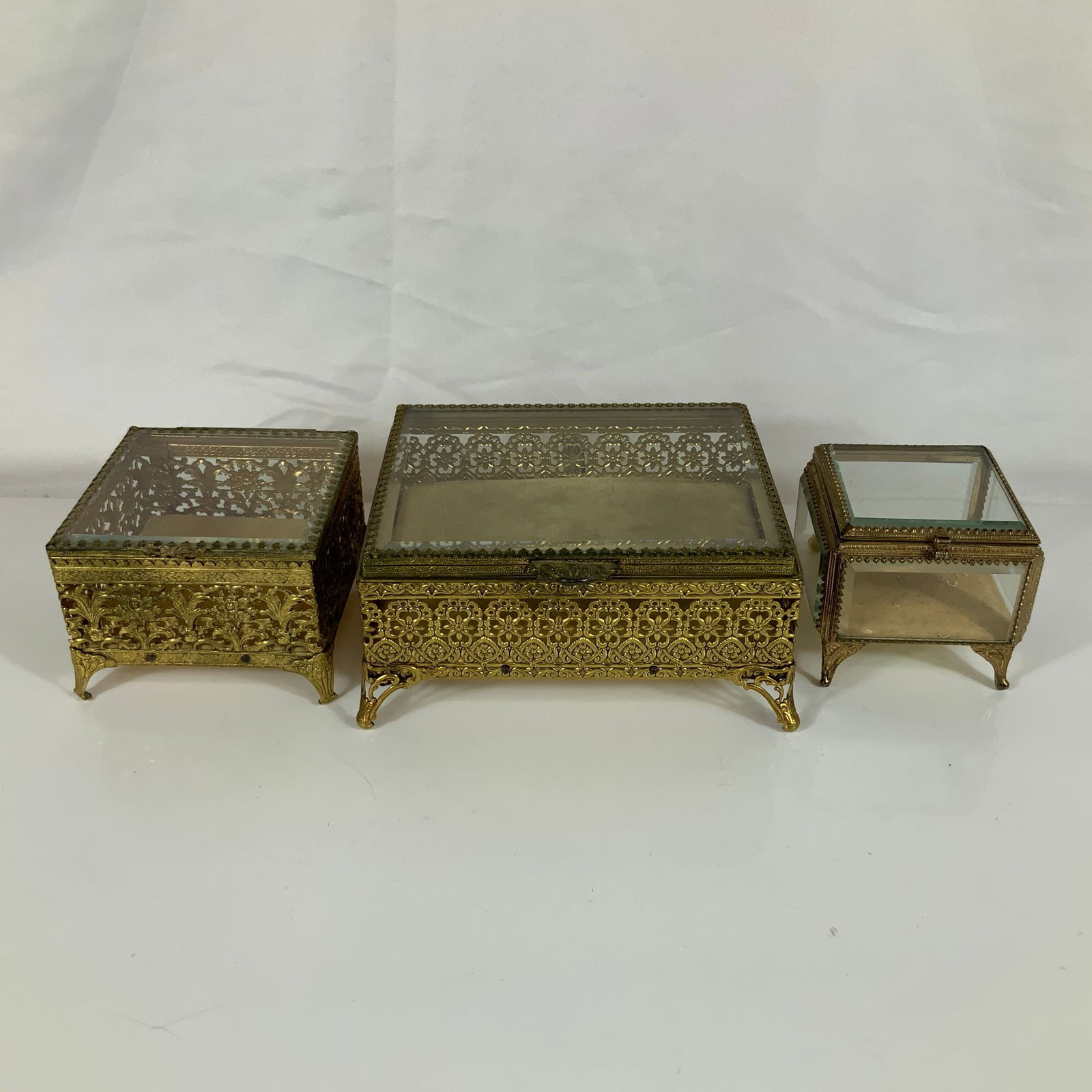 Three Hollywood Regency Style Gilt Filigree and Beveled Glass Jewelry Casket Boxes (1 of 4)