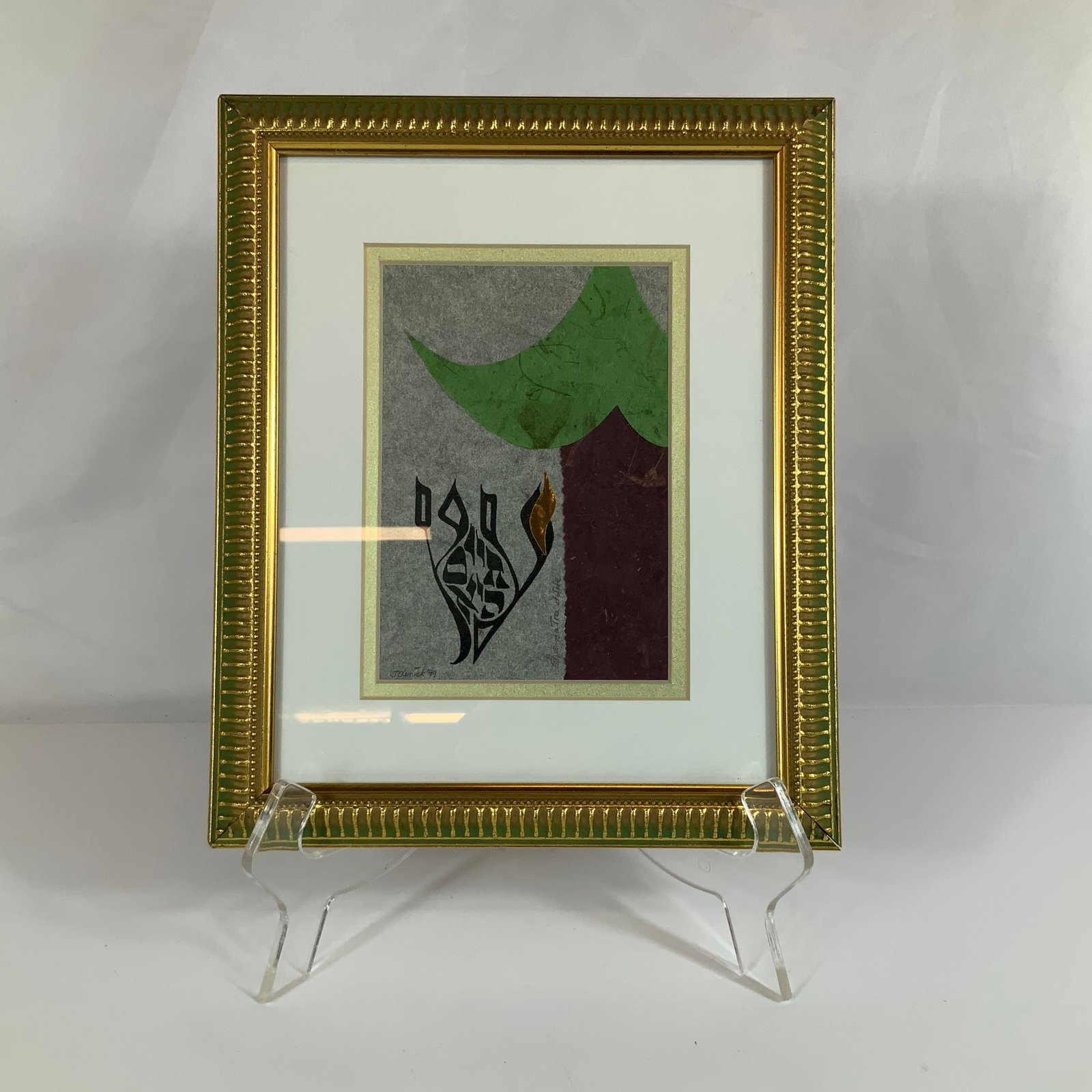 Jackie Olenick Tree of Life Original Paper Collage and Silkscreen Dated 1999: This original paper collage and silkscreen is by American artist Jackie Olenick and is titled Tree of Life (Eitz Chayyim). The artwork features a stylized tree form with a textured maroon trunk and a