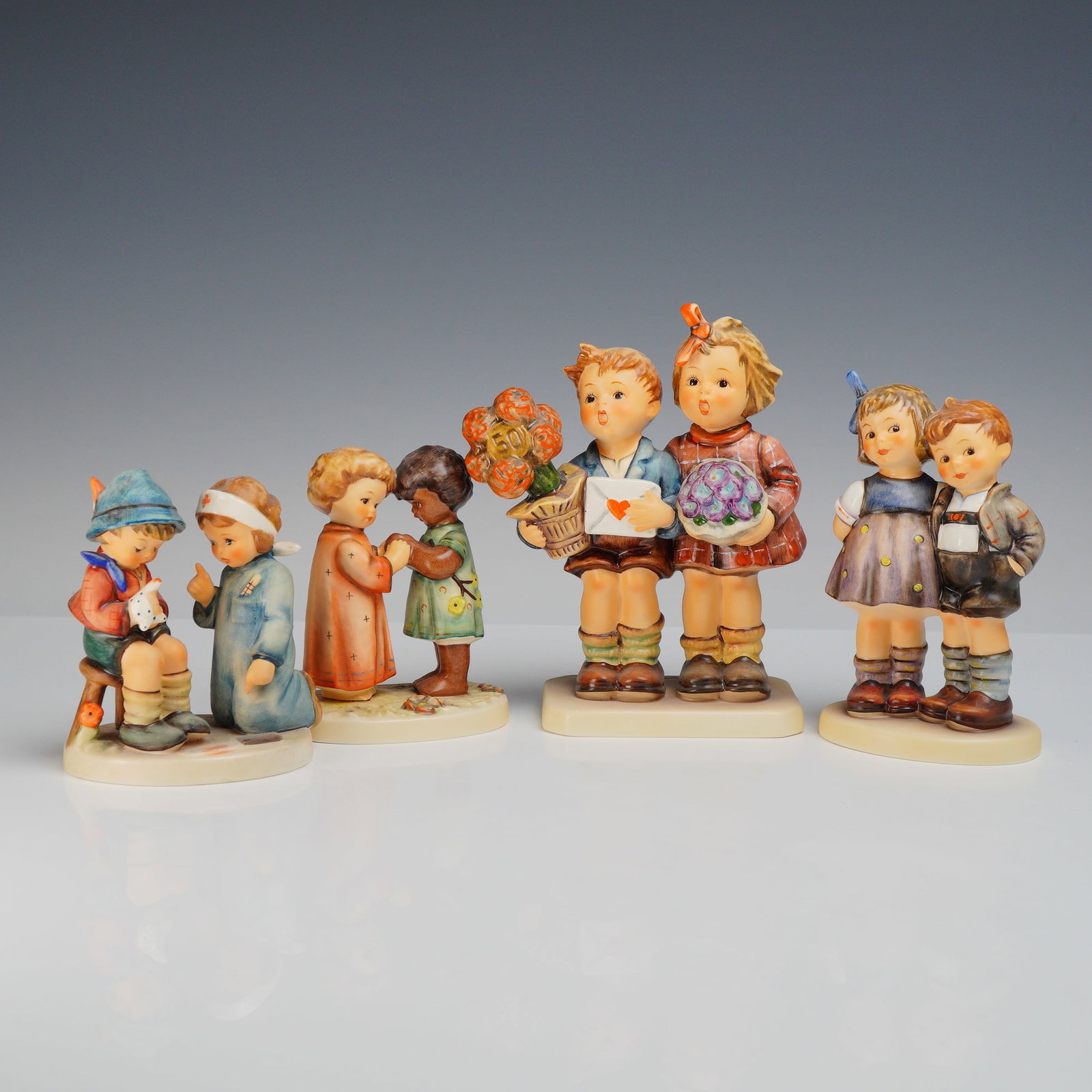 Four Goebel M.I. Hummel Hand Painted Porcelain Figurines Including Commemorative Editions (1 of 3)